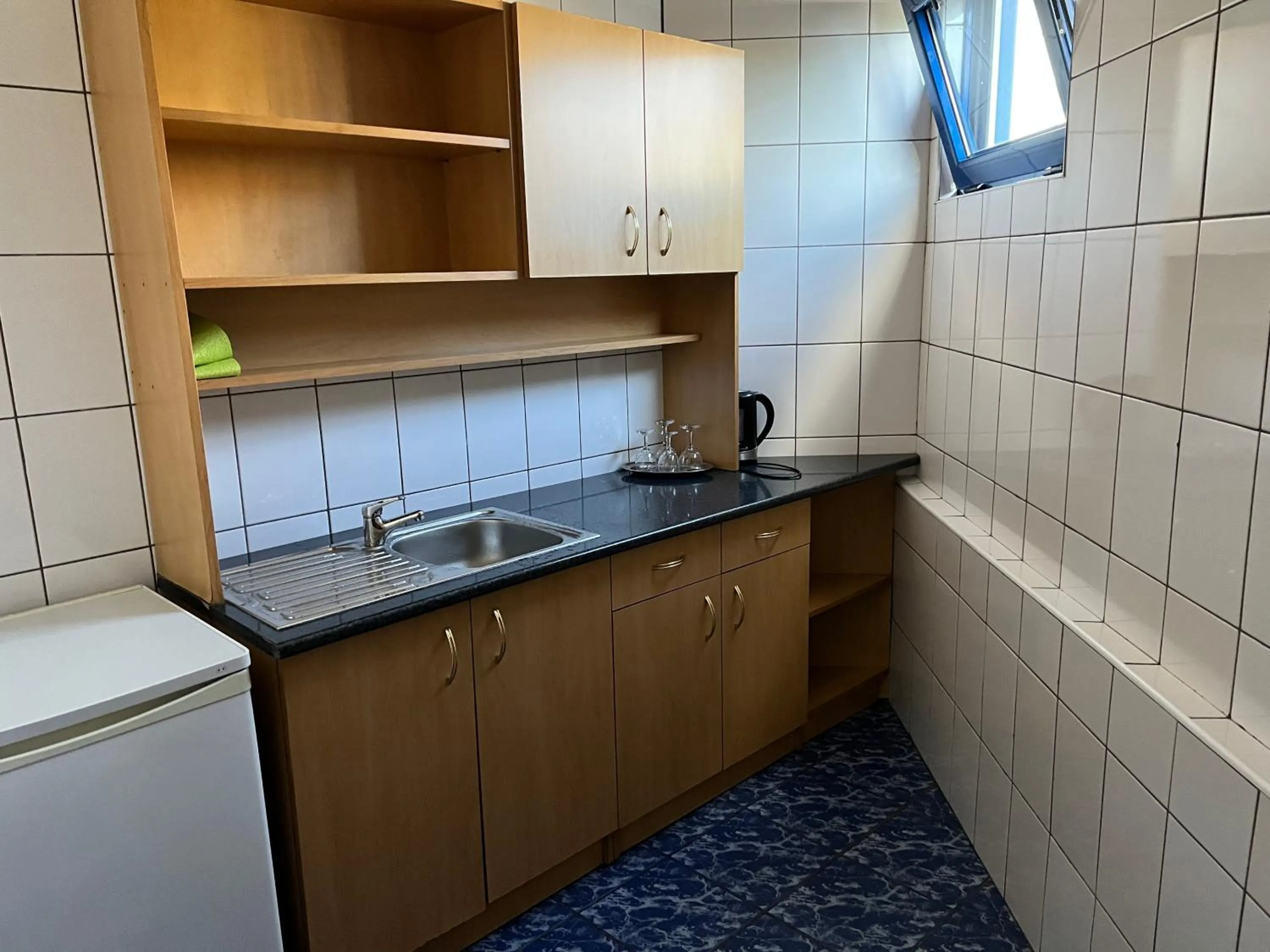Kitchen or kitchenette in Motel Carmen