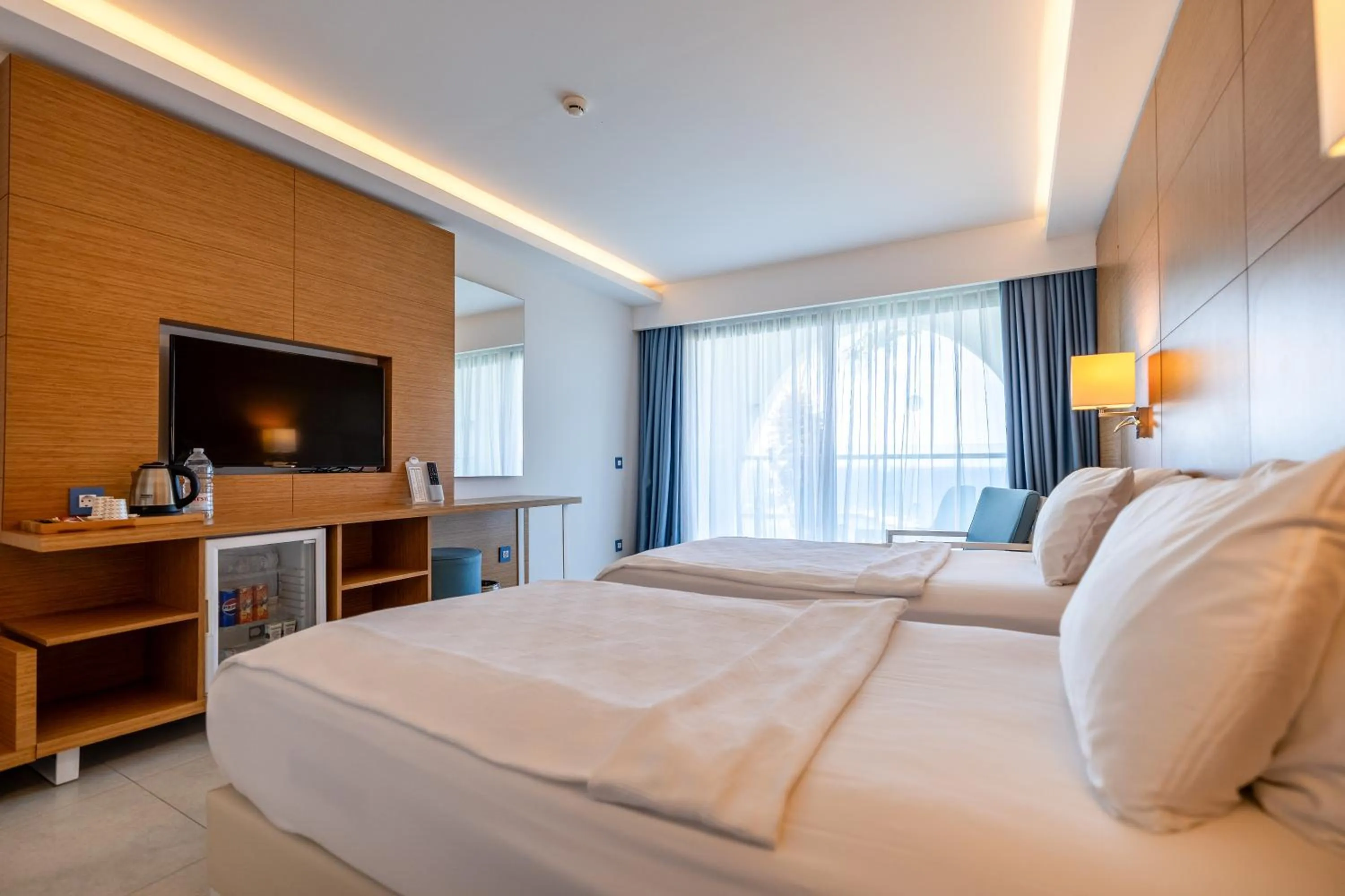 Bed in INFINITY BY YELKEN AQUAPARK&RESORTS KUŞADASI