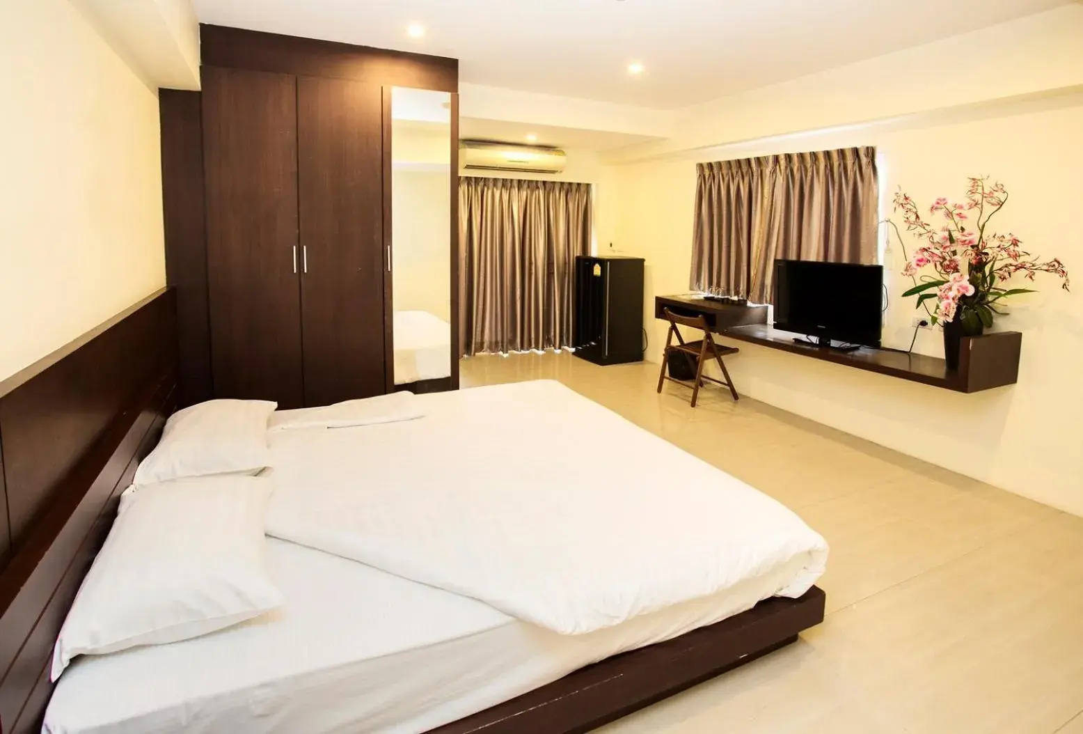 Bed in The Loft Resort Bangkok