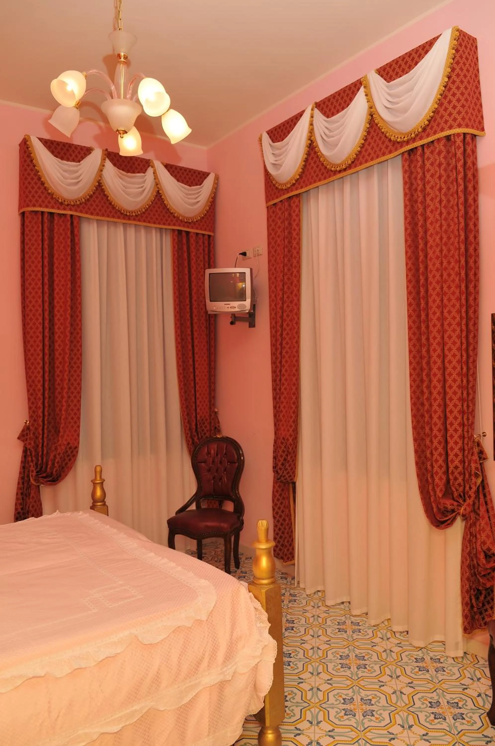 Bed in Albergo Roses