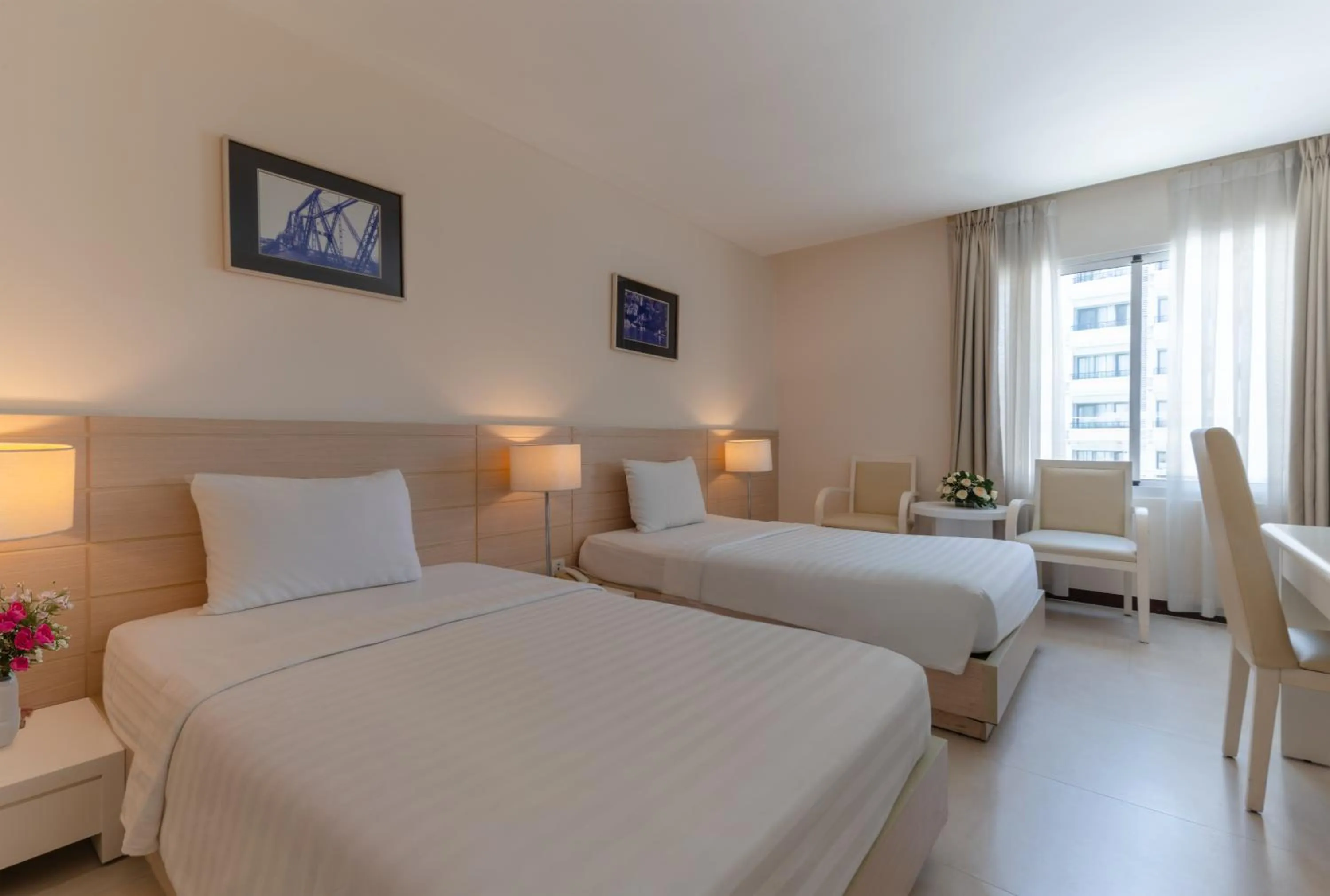 Photo of the whole room, Bed in Nhi Phi Hotel