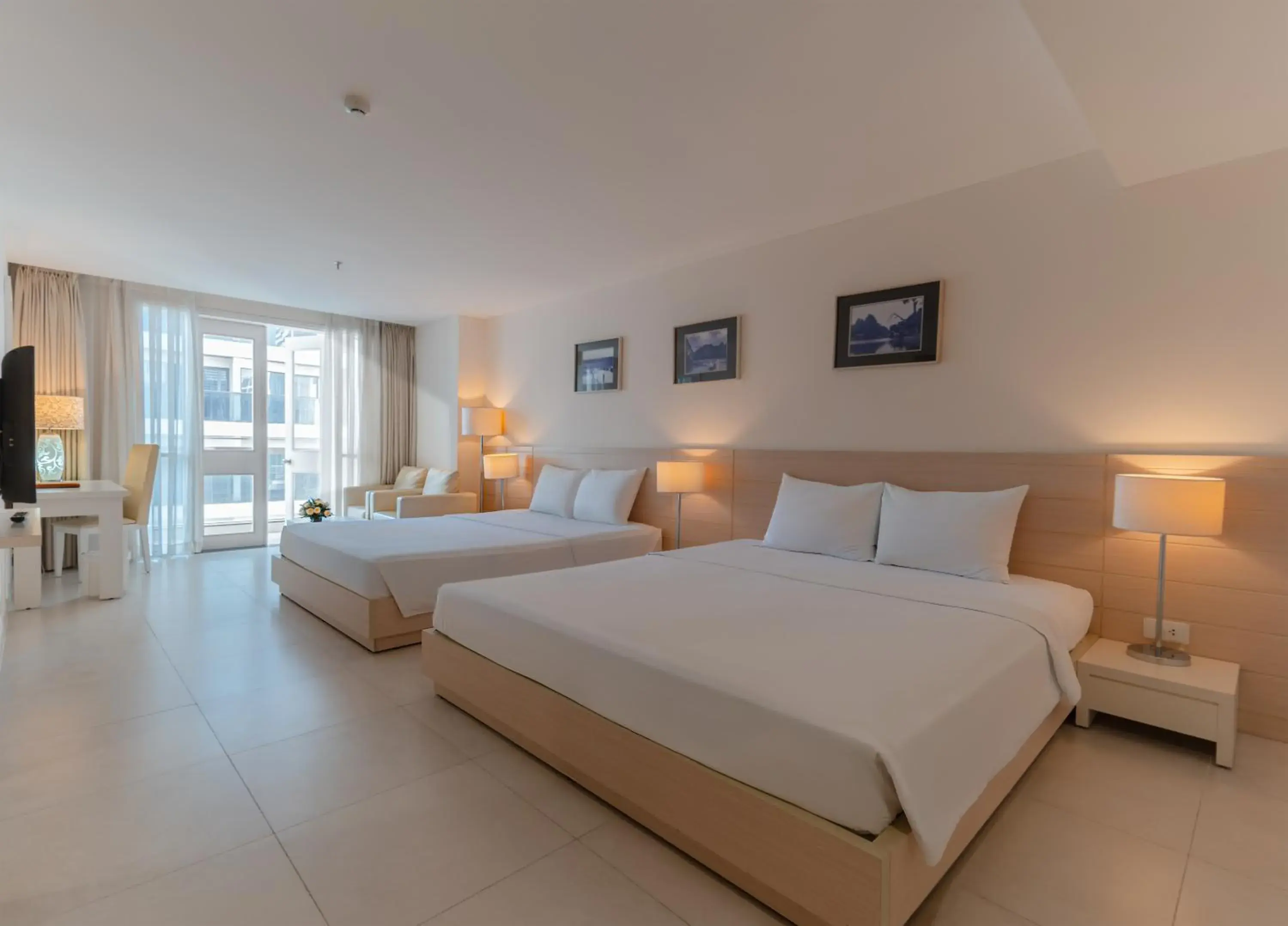 Photo of the whole room, Bed in Nhi Phi Hotel Photo of the whole room, Bed in Nhi Phi Hotel