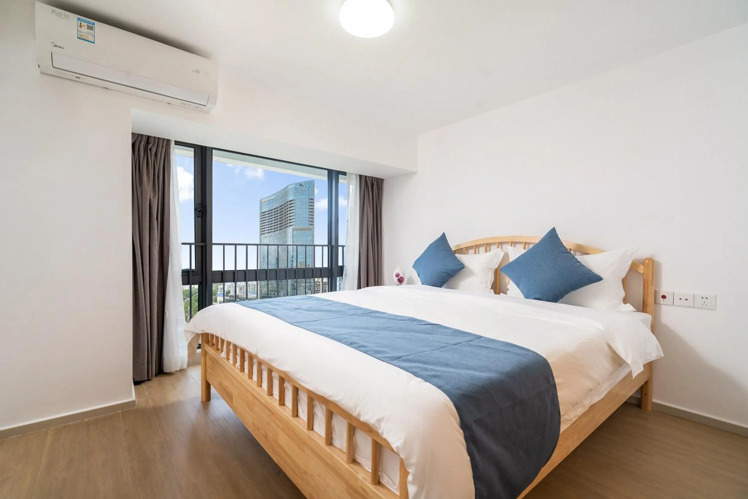 Bedroom, Bed in Neal Yat Seaview Apartment Haitang Bay Sanya