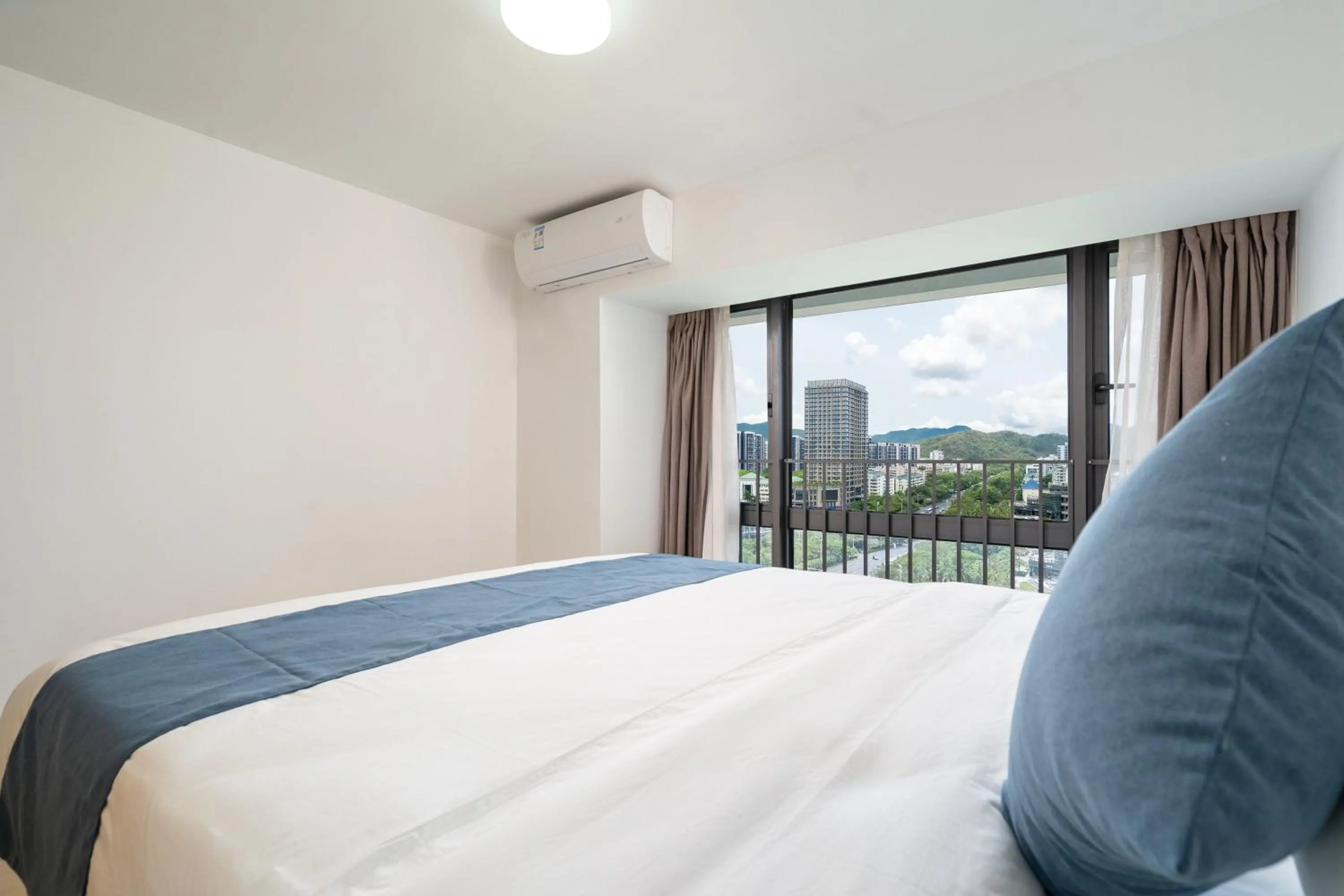 Bedroom, Bed in Neal Yat Seaview Apartment Haitang Bay Sanya