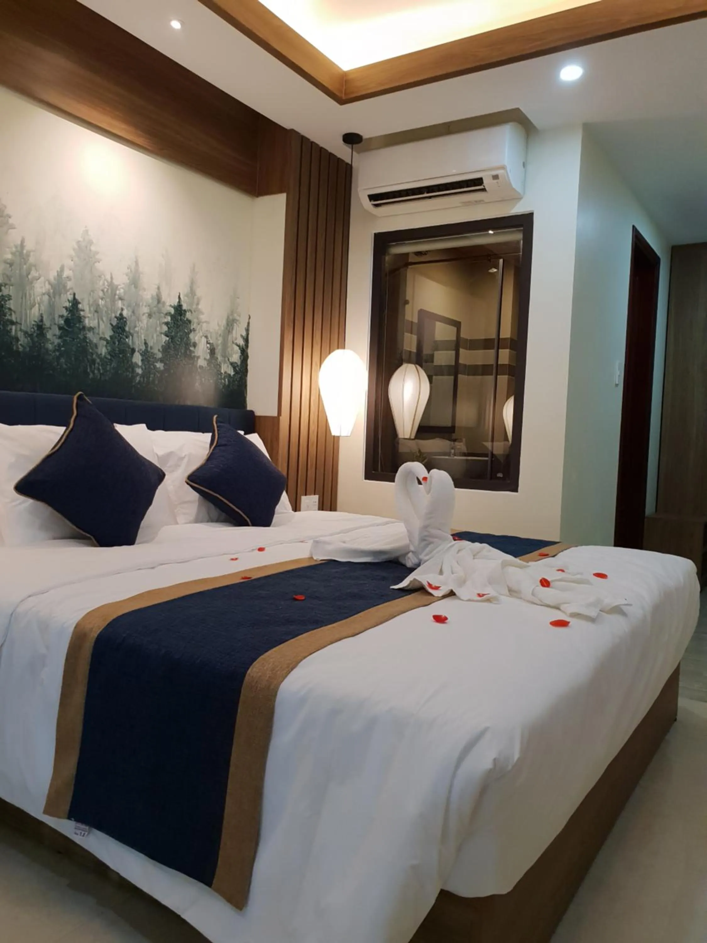 Bed in Southern Hotel Hoi An