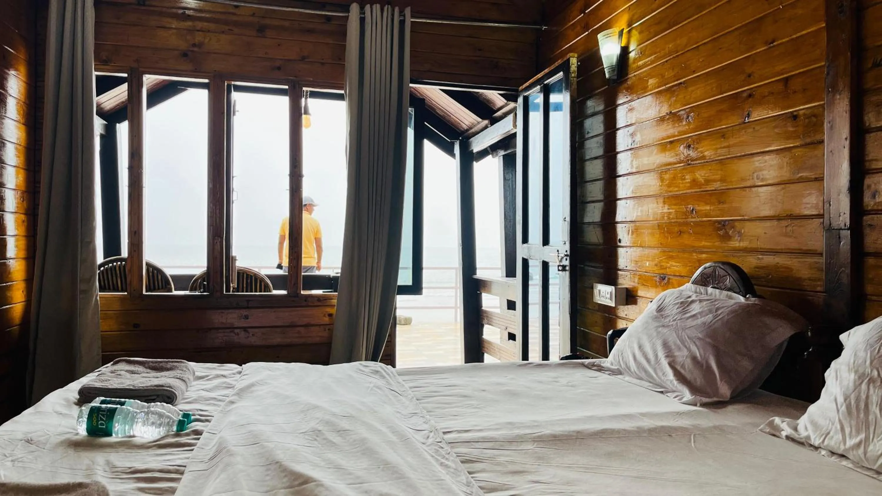 Bed in Palolem Luxuries Beach Cottages