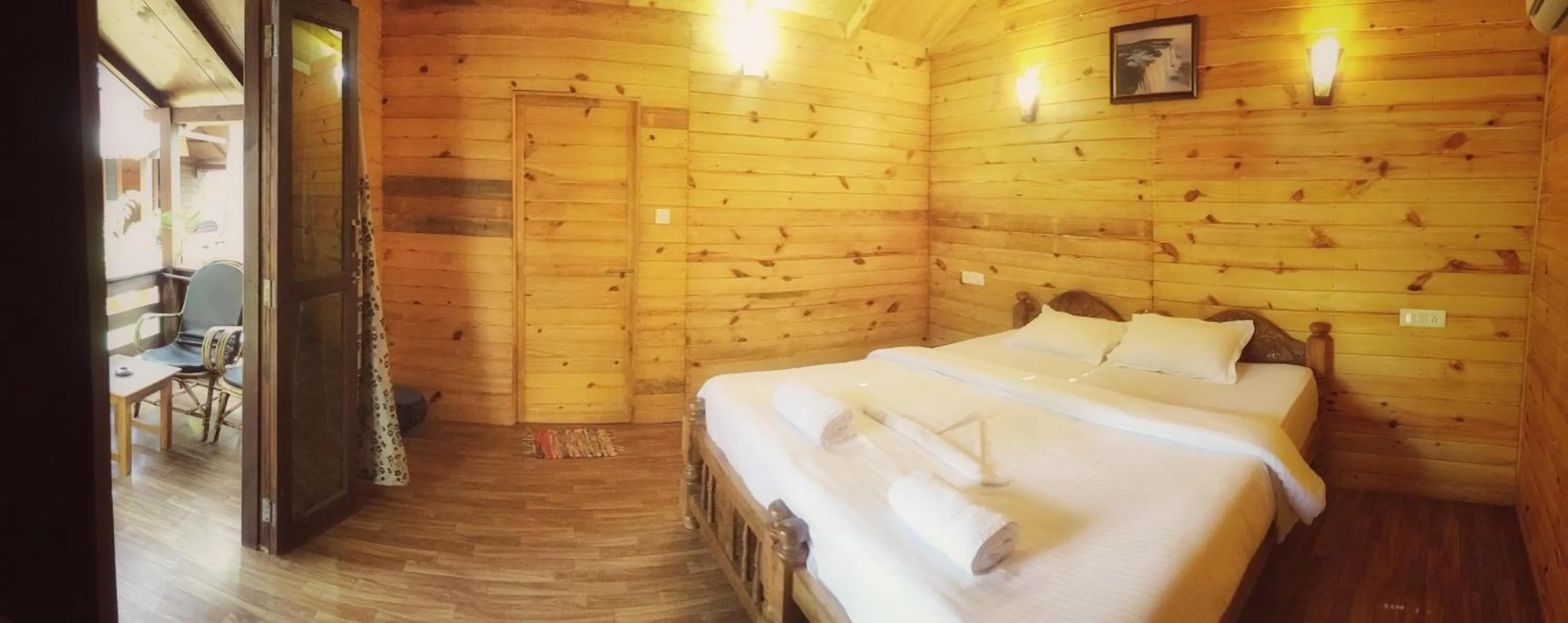 Bed in Palolem Luxuries Beach Cottages