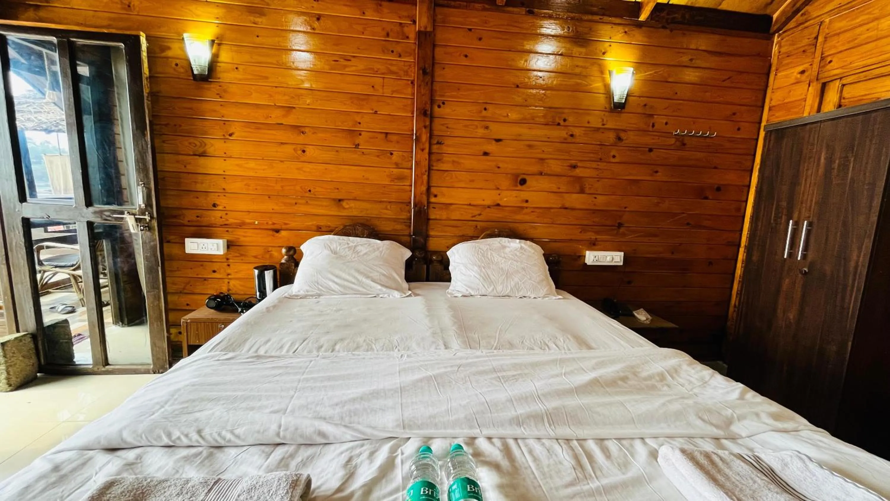 Bed in Palolem Luxuries Beach Cottages