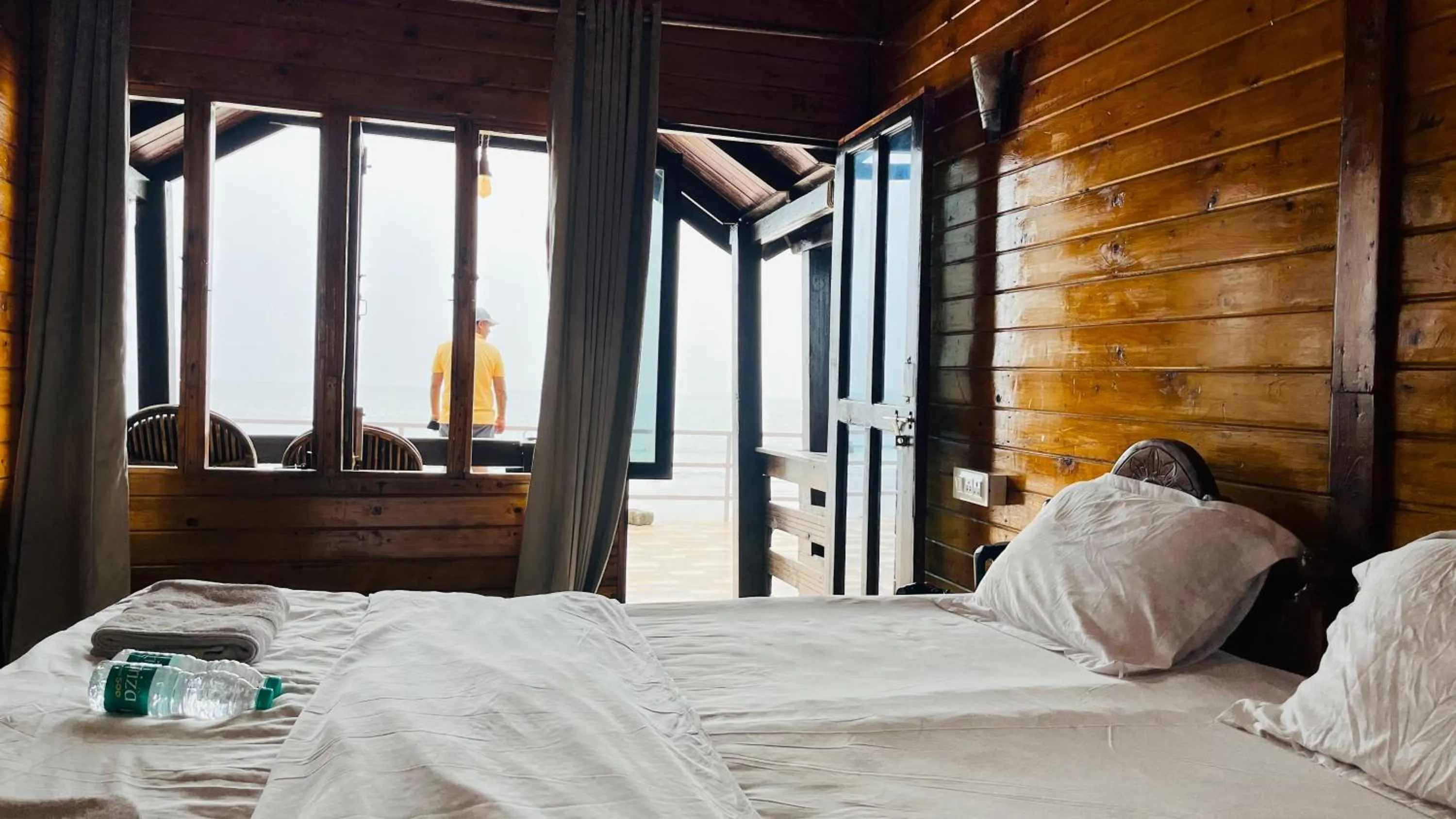 Bed in Palolem Luxuries Beach Cottages