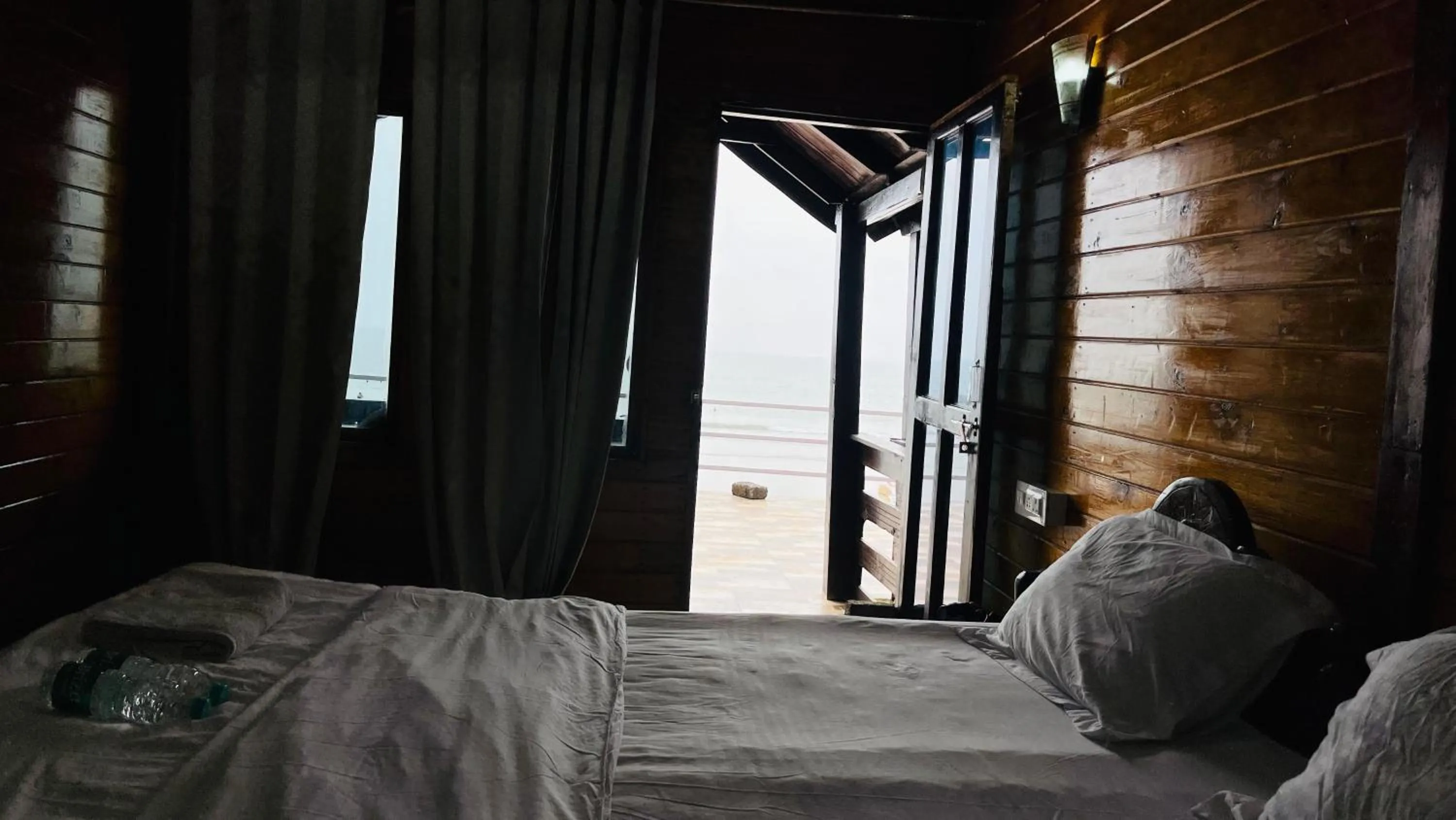 Bed in Palolem Luxuries Beach Cottages