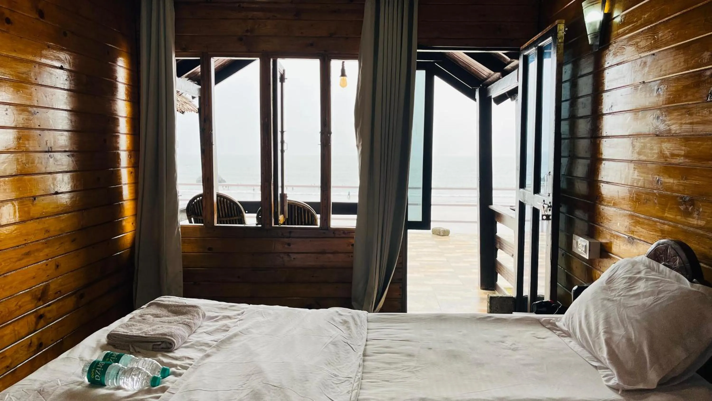 Bed in Palolem Luxuries Beach Cottages