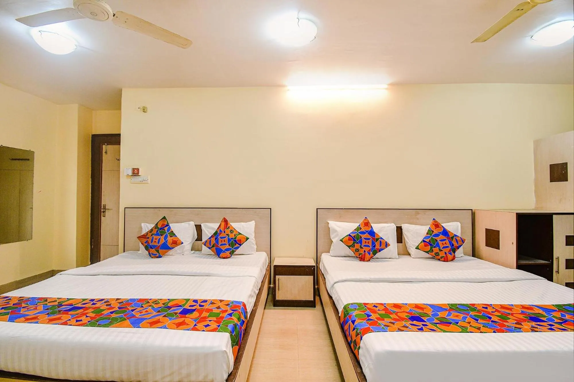 Bed in FabHotel Kamala Inn