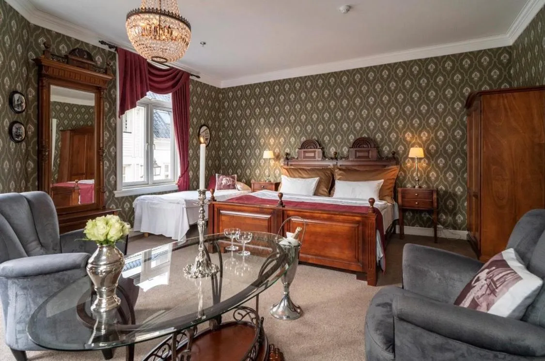 Photo of the whole room, Bed in Grand Hotel Flekkefjord