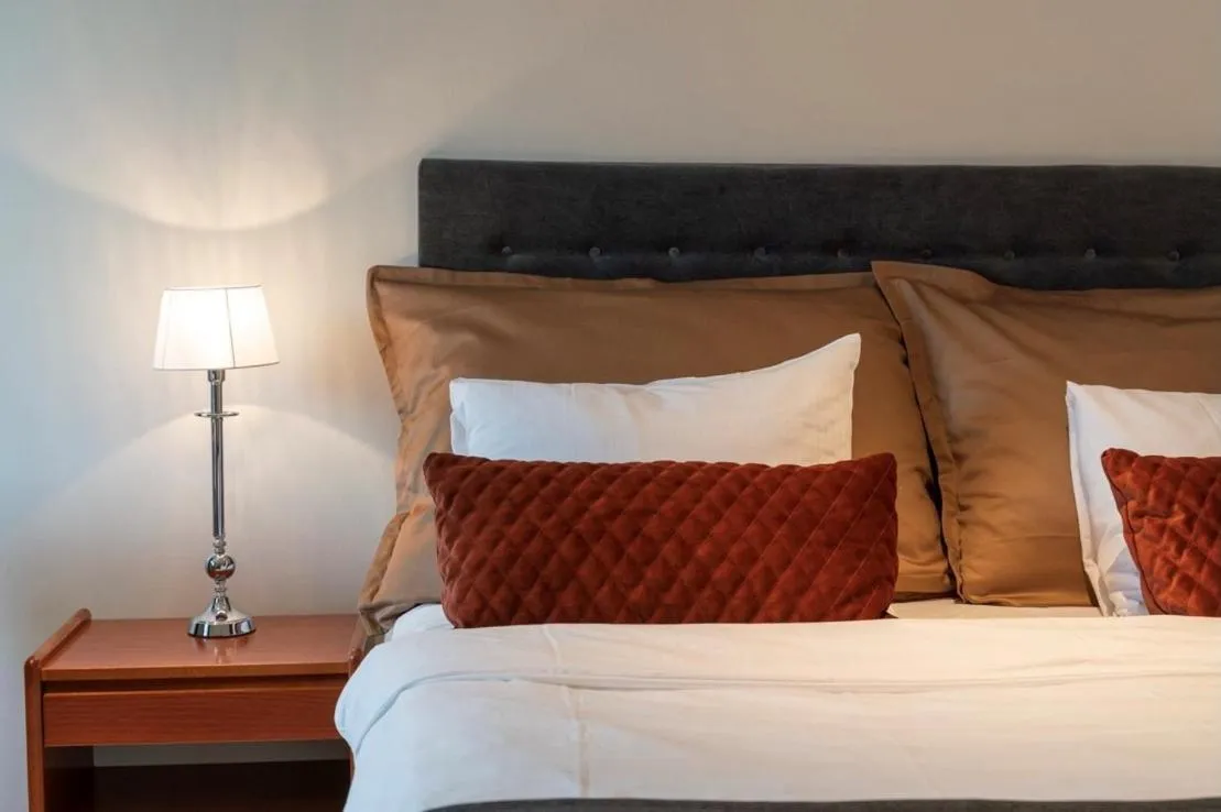 Bed in Grand Hotel Flekkefjord