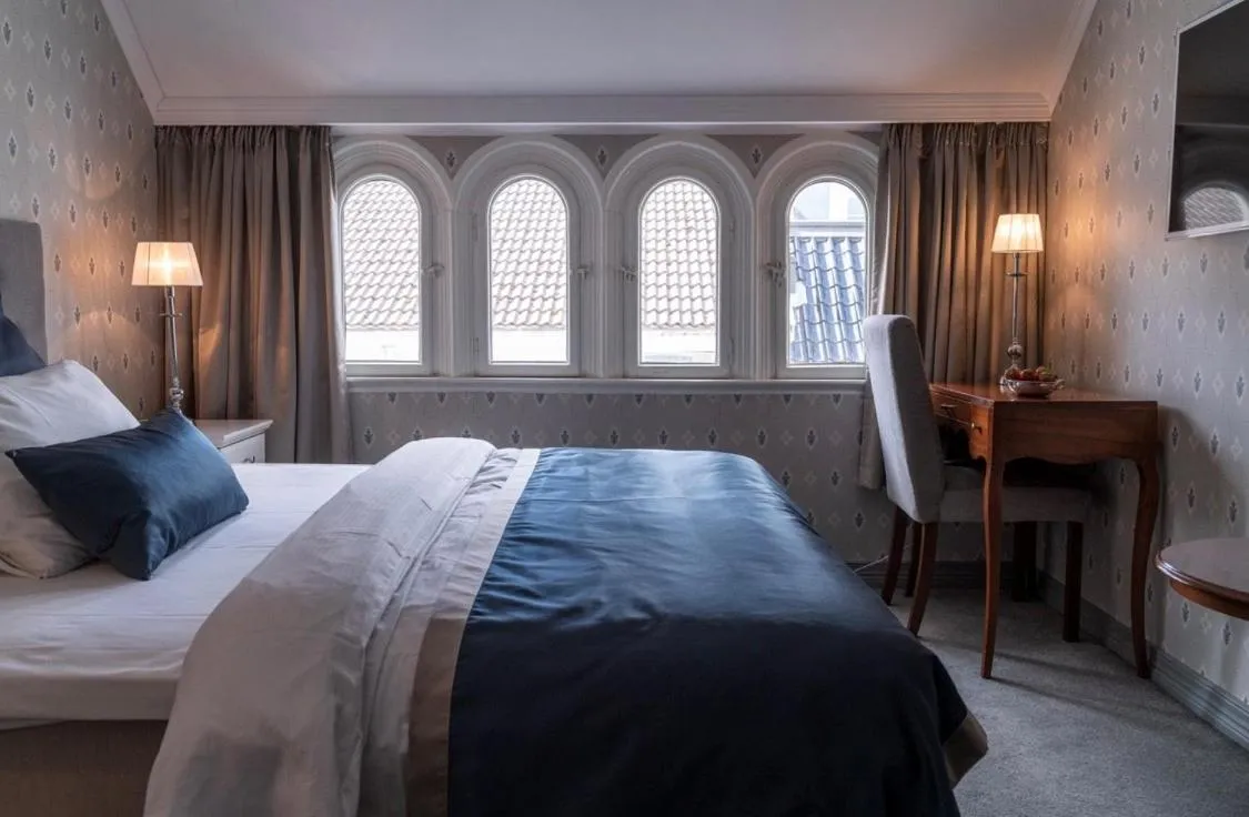 Bed in Grand Hotel Flekkefjord