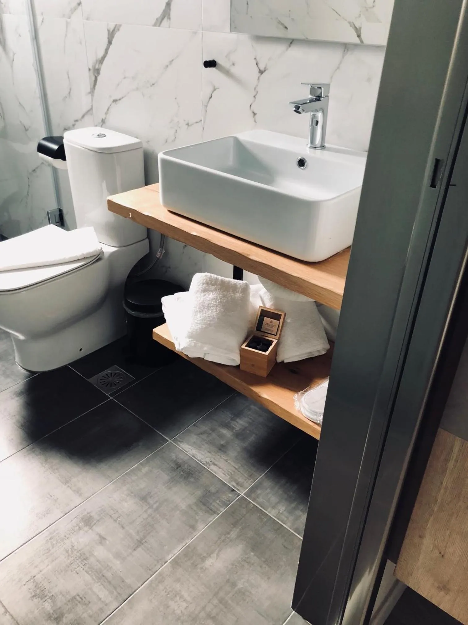 Shower in CHROMA FASHION ROOMS & APARTMENTS