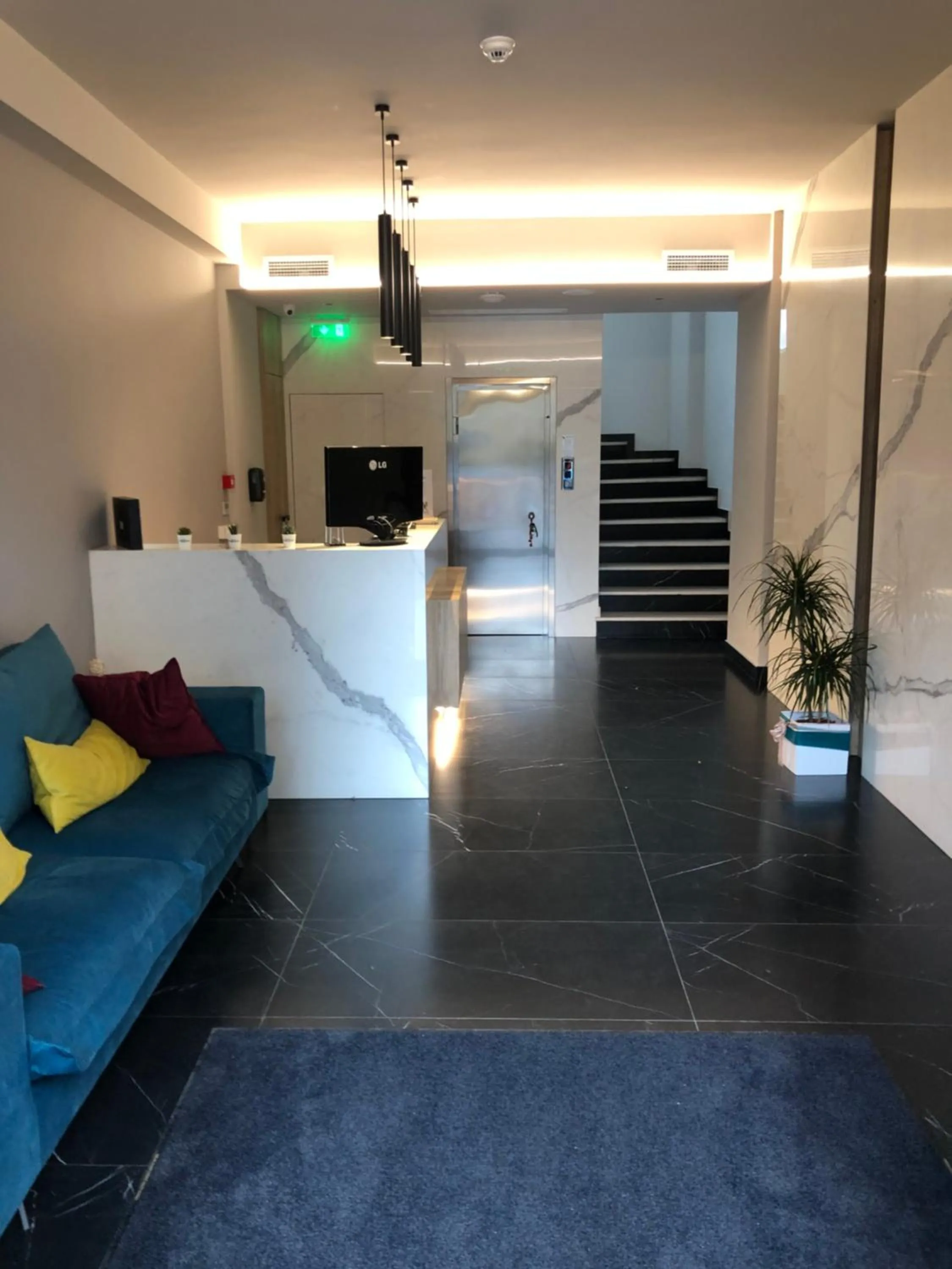 Lobby or reception in CHROMA FASHION ROOMS & APARTMENTS