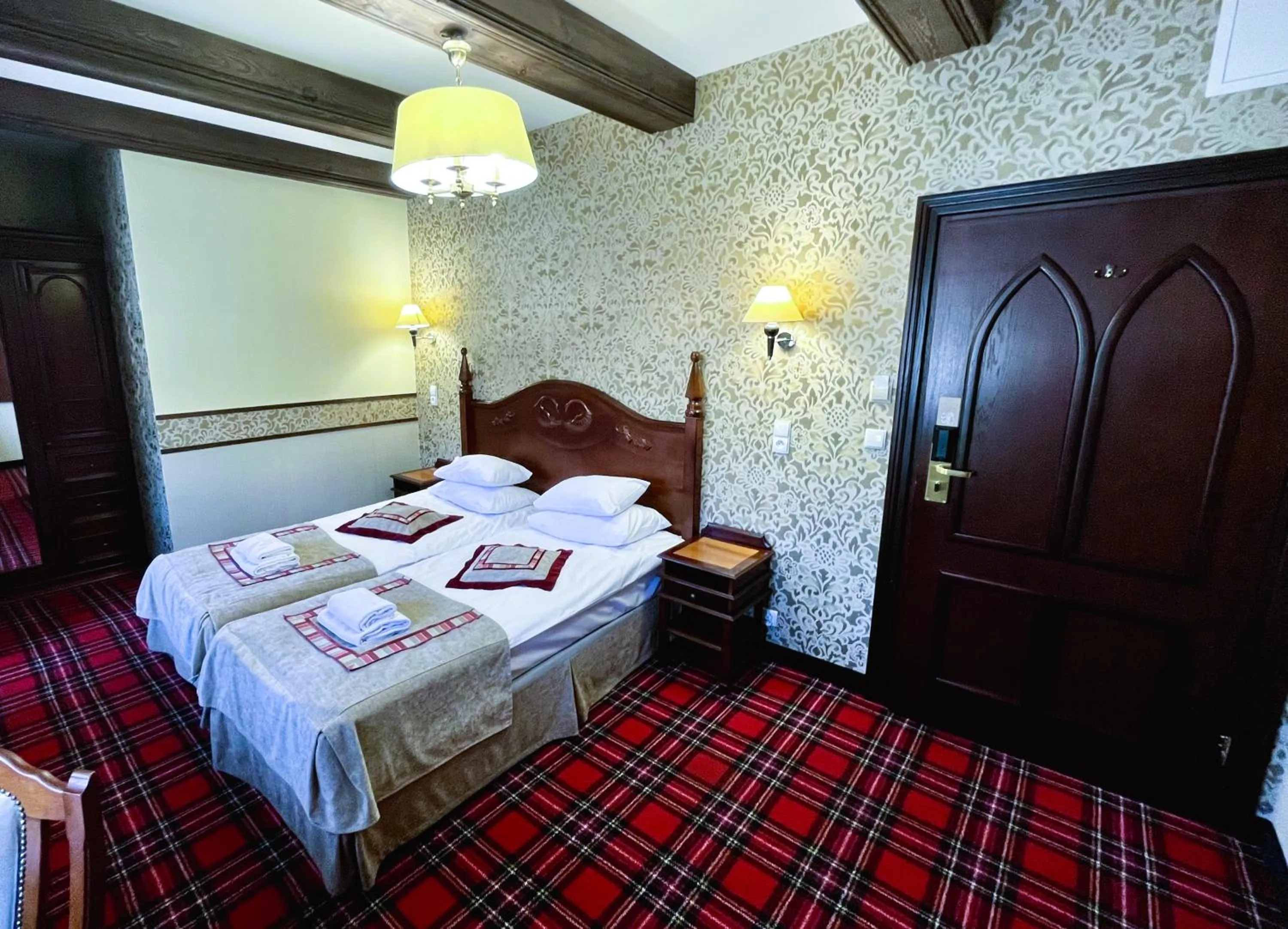 Photo of the whole room, Bed in Gościniec Ryński Młyn