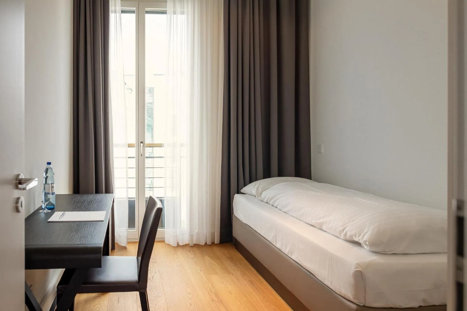 Bed in The Wellem Residences