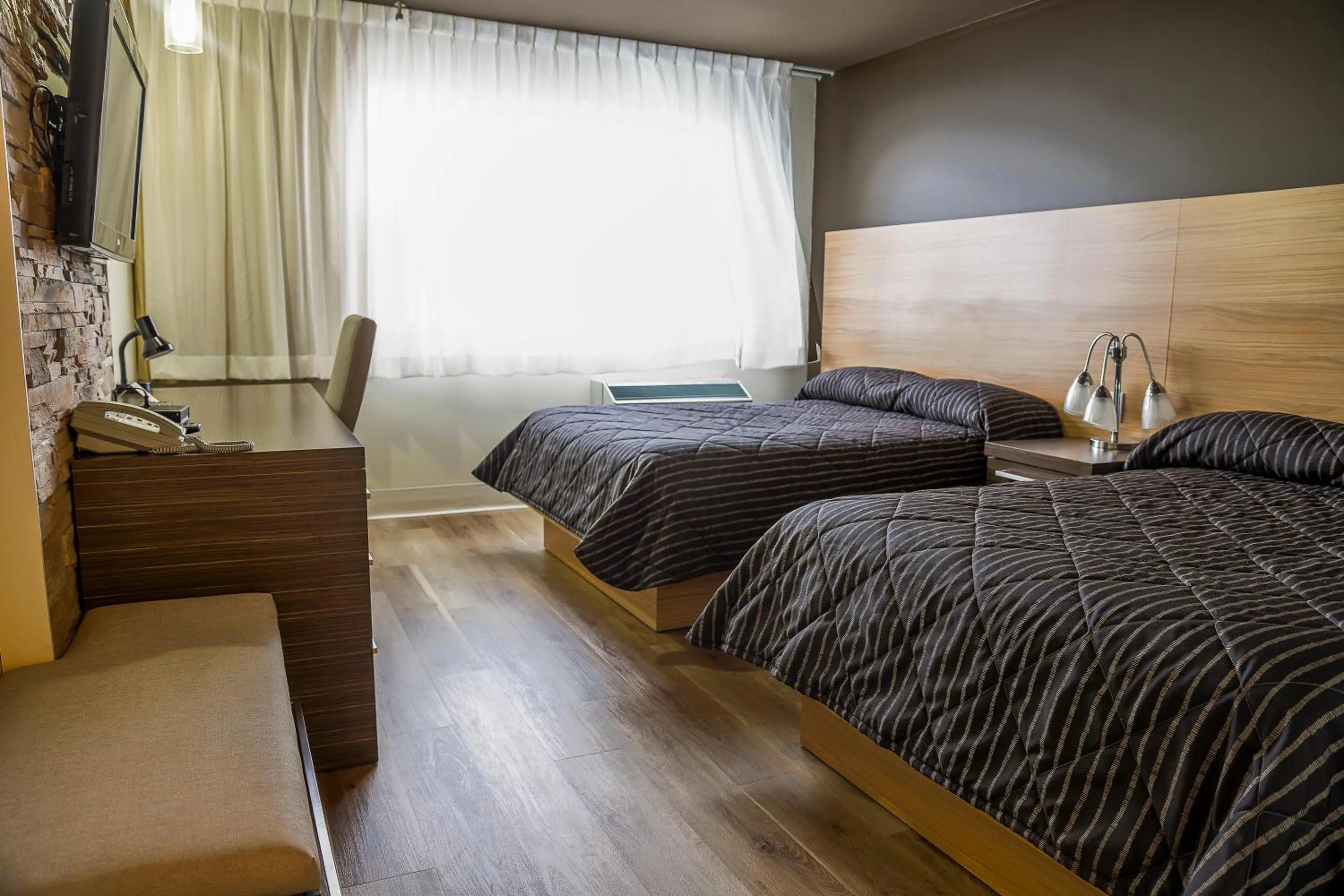 Bed in Complexe Hotelier Le 55