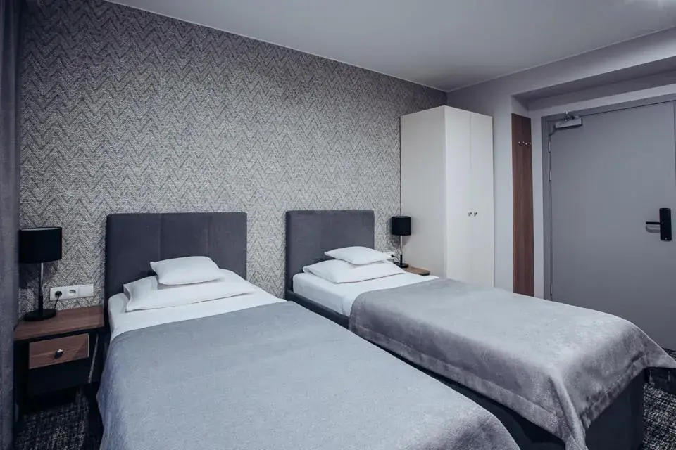 Deluxe Twin Room - single occupancy in Miejsca noclegowe i Restauracja Kamiński Deluxe Twin Room - single occupancy in Miejsca noclegowe i Restauracja Kamiński