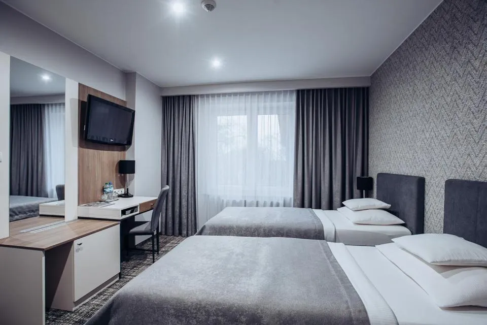 Bed in Miejsca noclegowe i Restauracja Kamiński