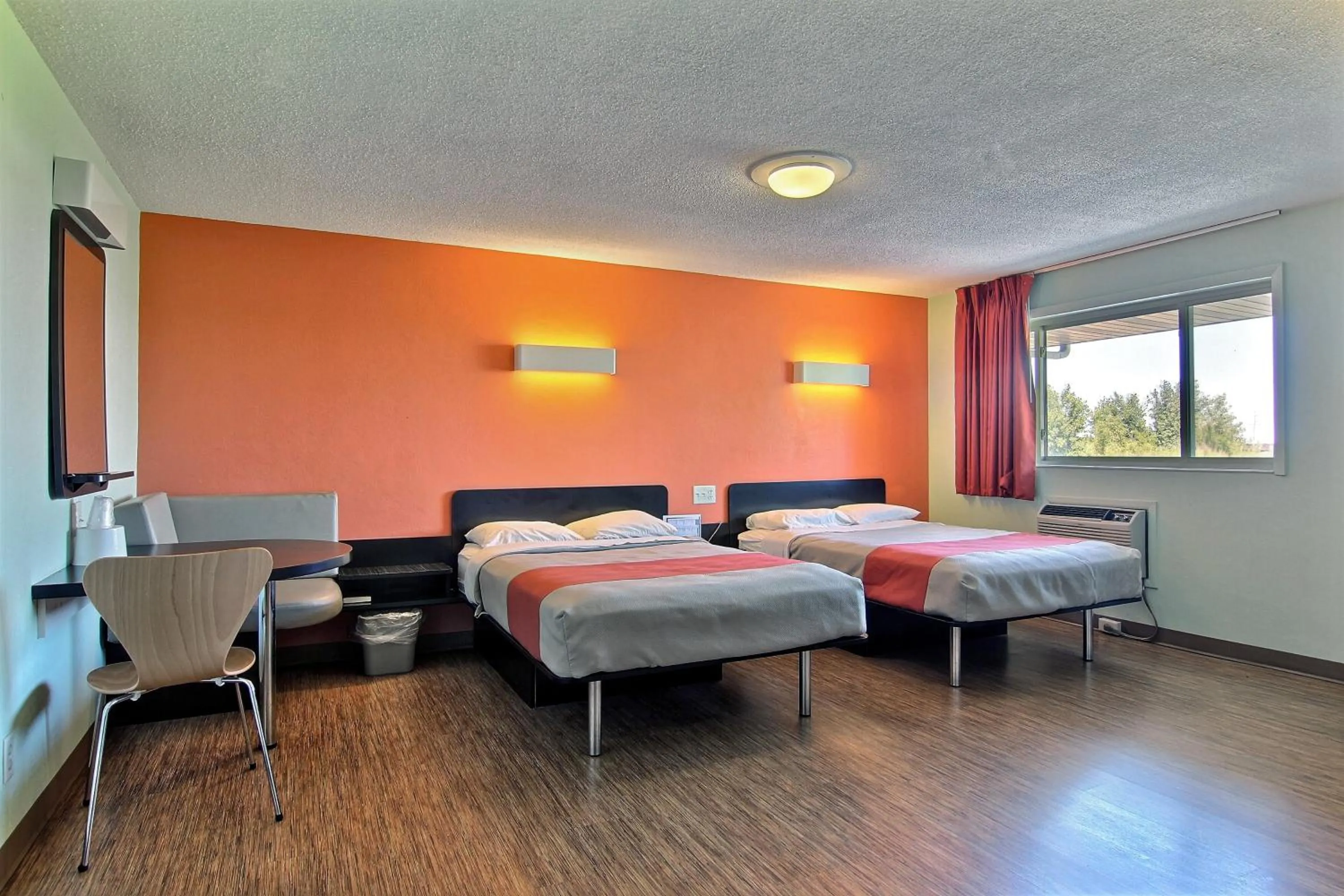 Seating area, Bed in Motel 6-Gilman, IL