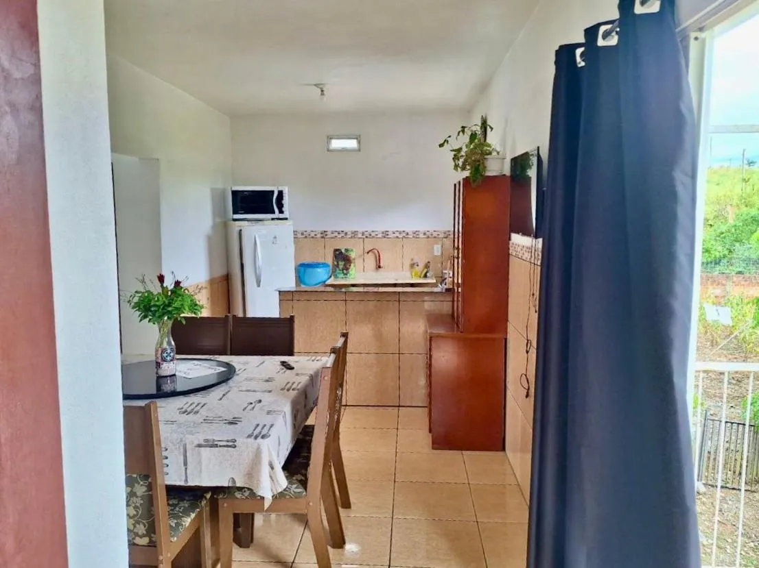 Kitchen or kitchenette in Pousada JP