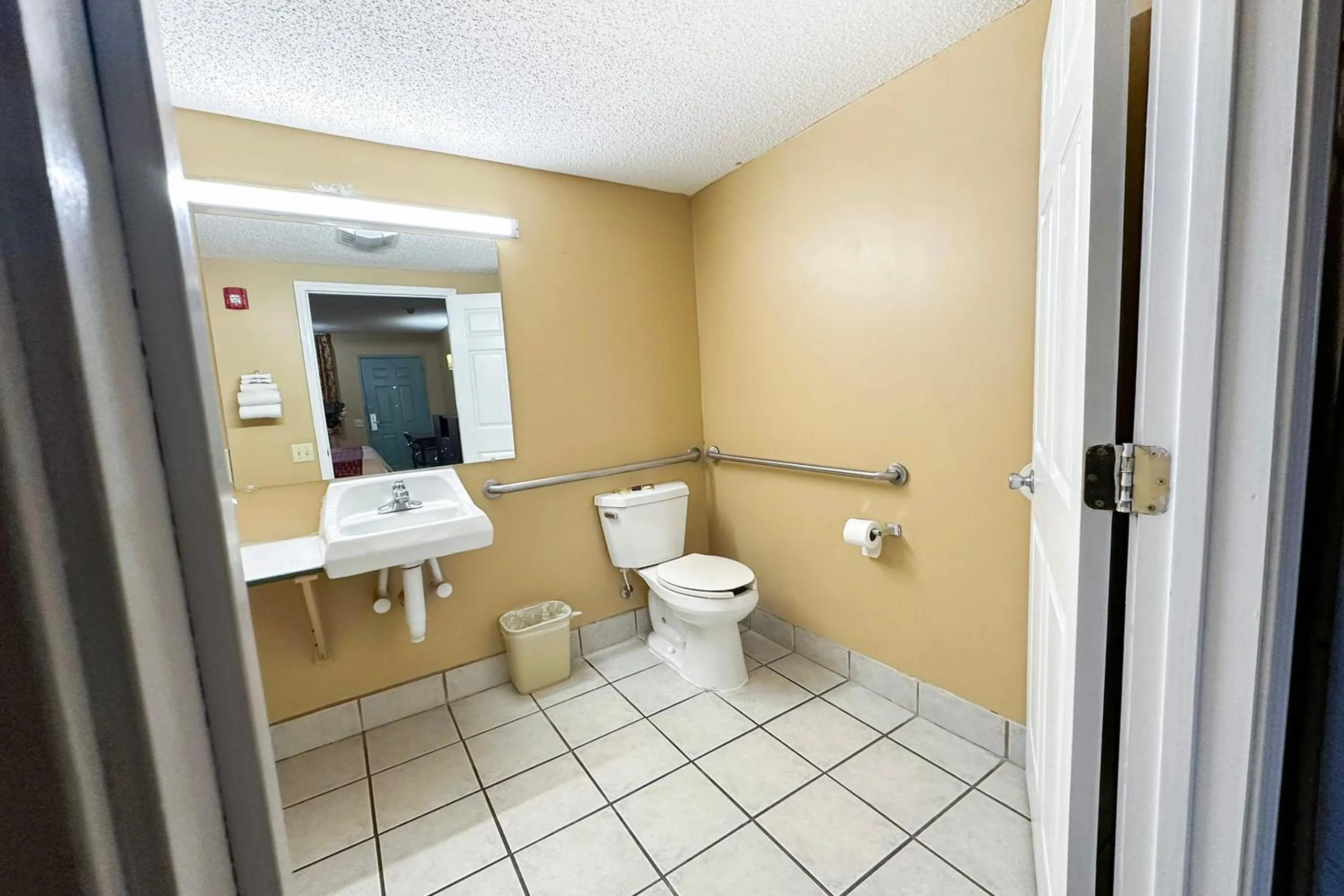 Bathroom in Garden Inn & Suites