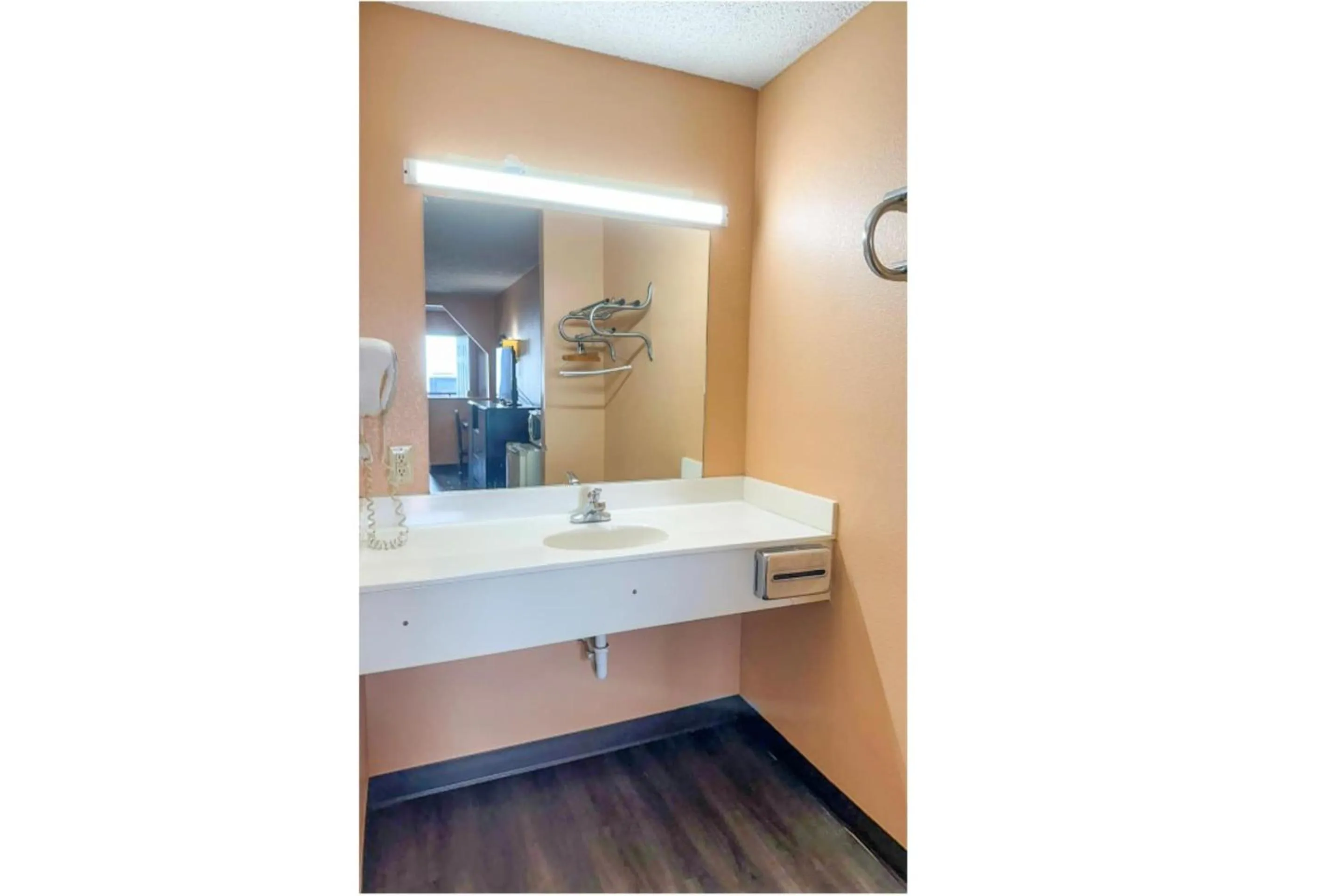 Bathroom in Garden Inn & Suites