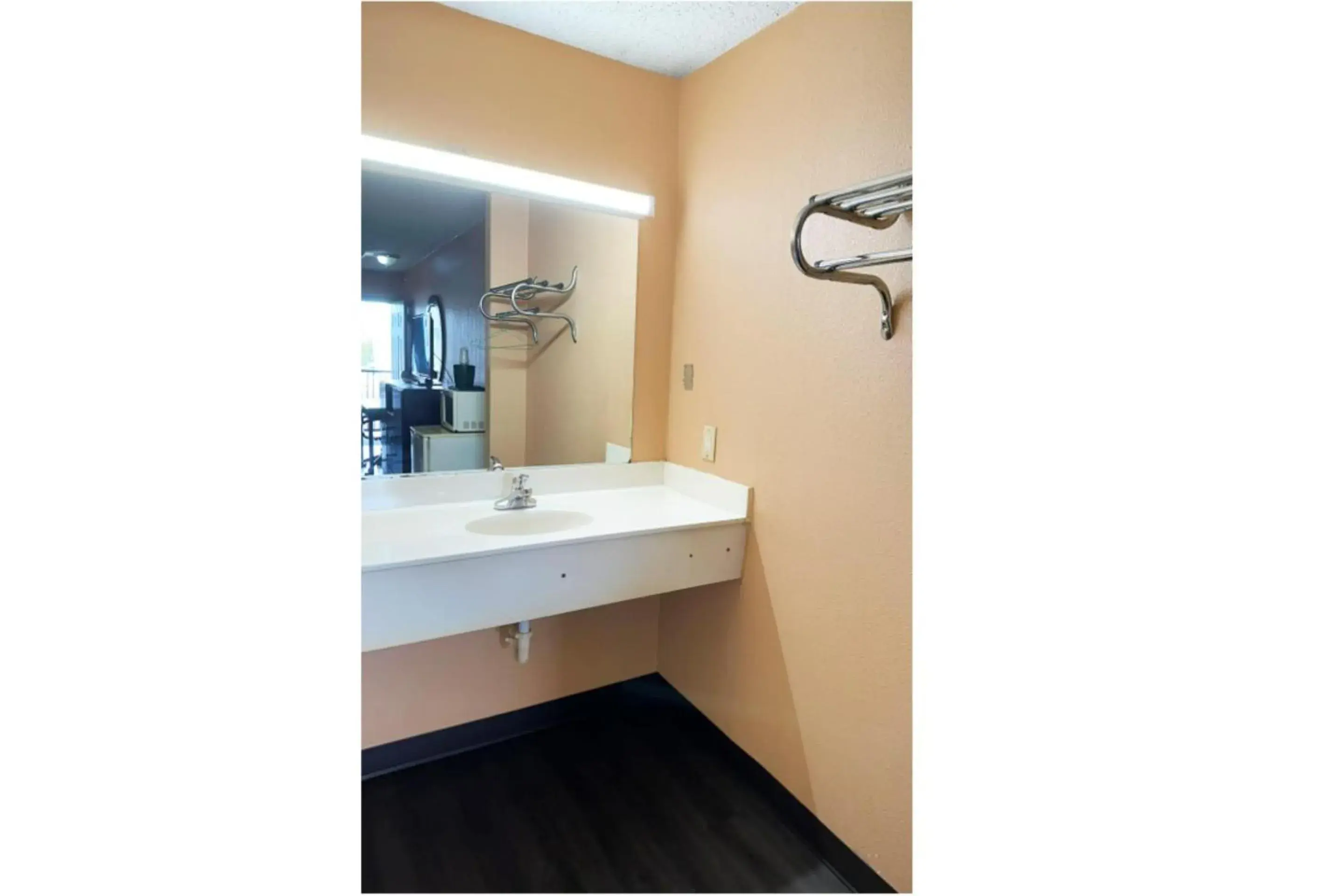 Bathroom in Garden Inn & Suites Bathroom in Garden Inn & Suites