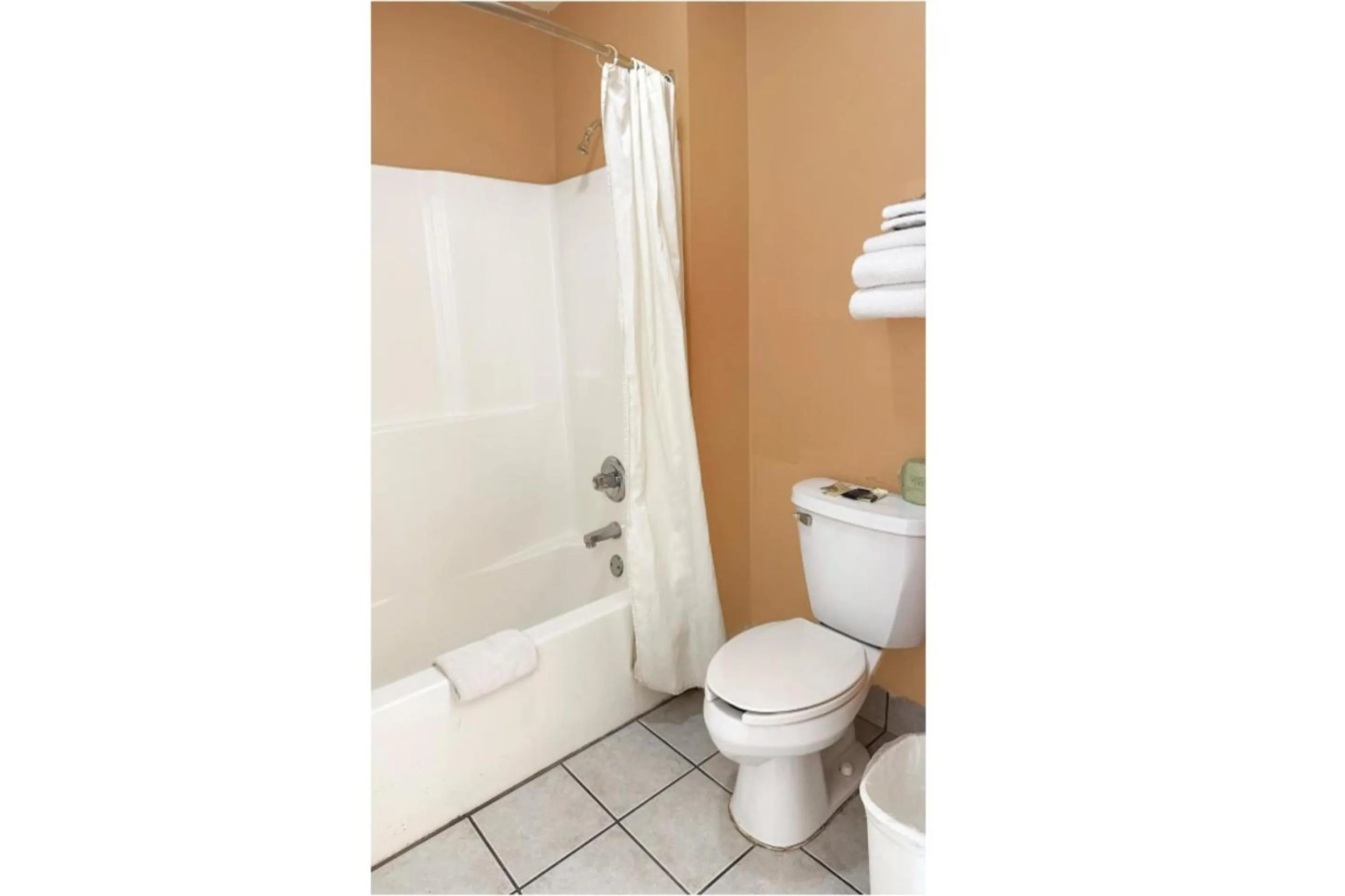 Bathroom in Garden Inn & Suites