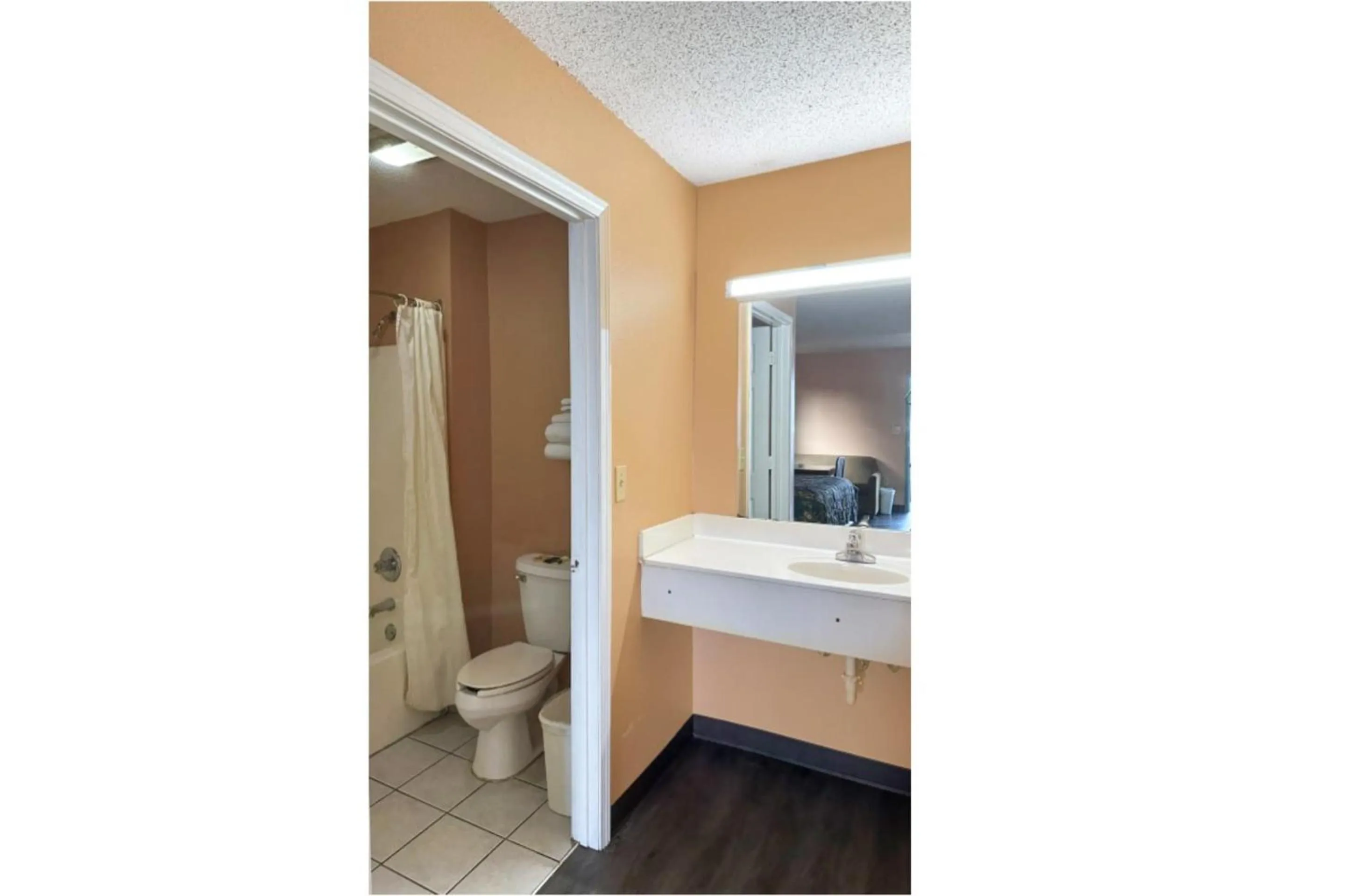 Bathroom in Garden Inn & Suites