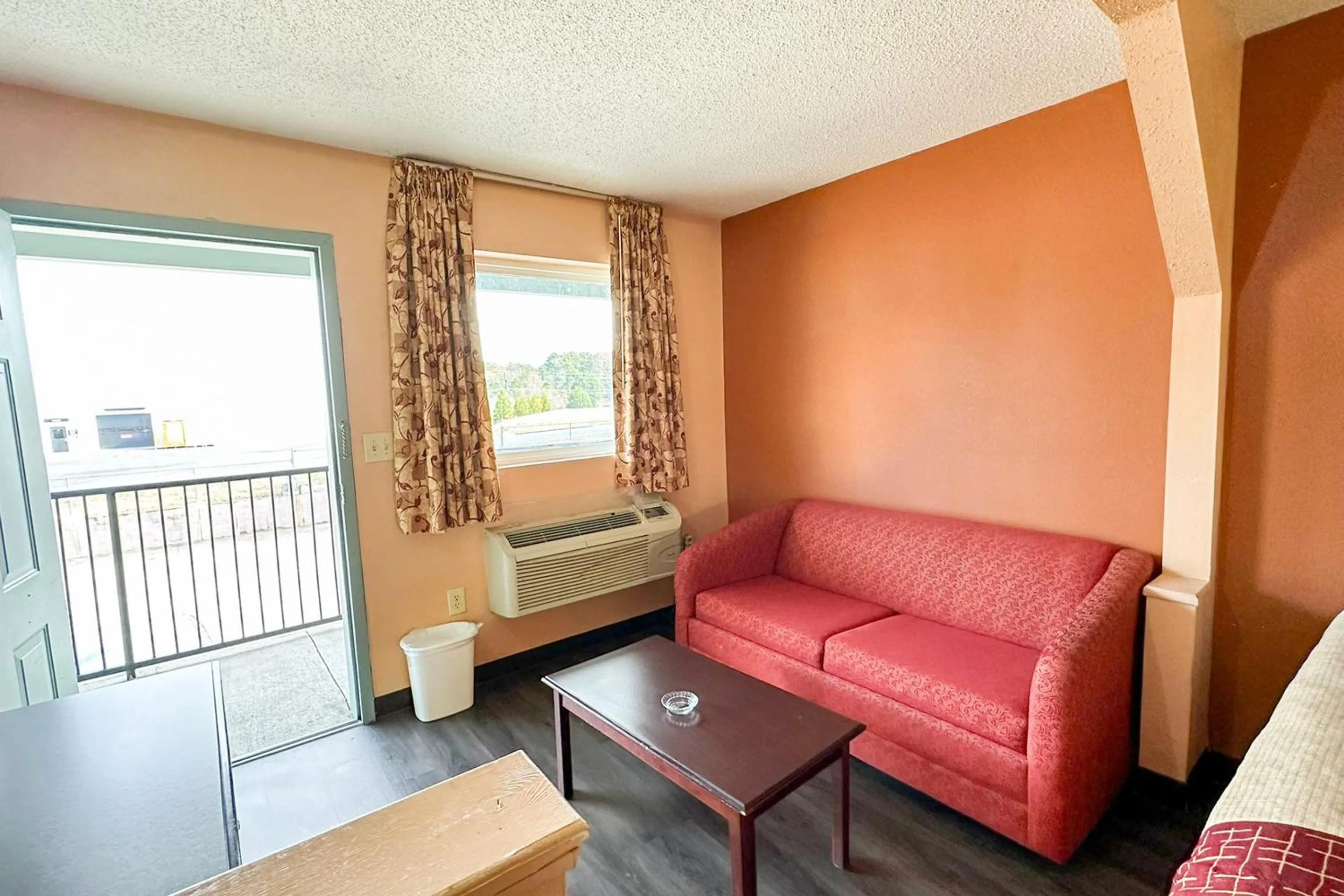 Bedroom in Garden Inn & Suites