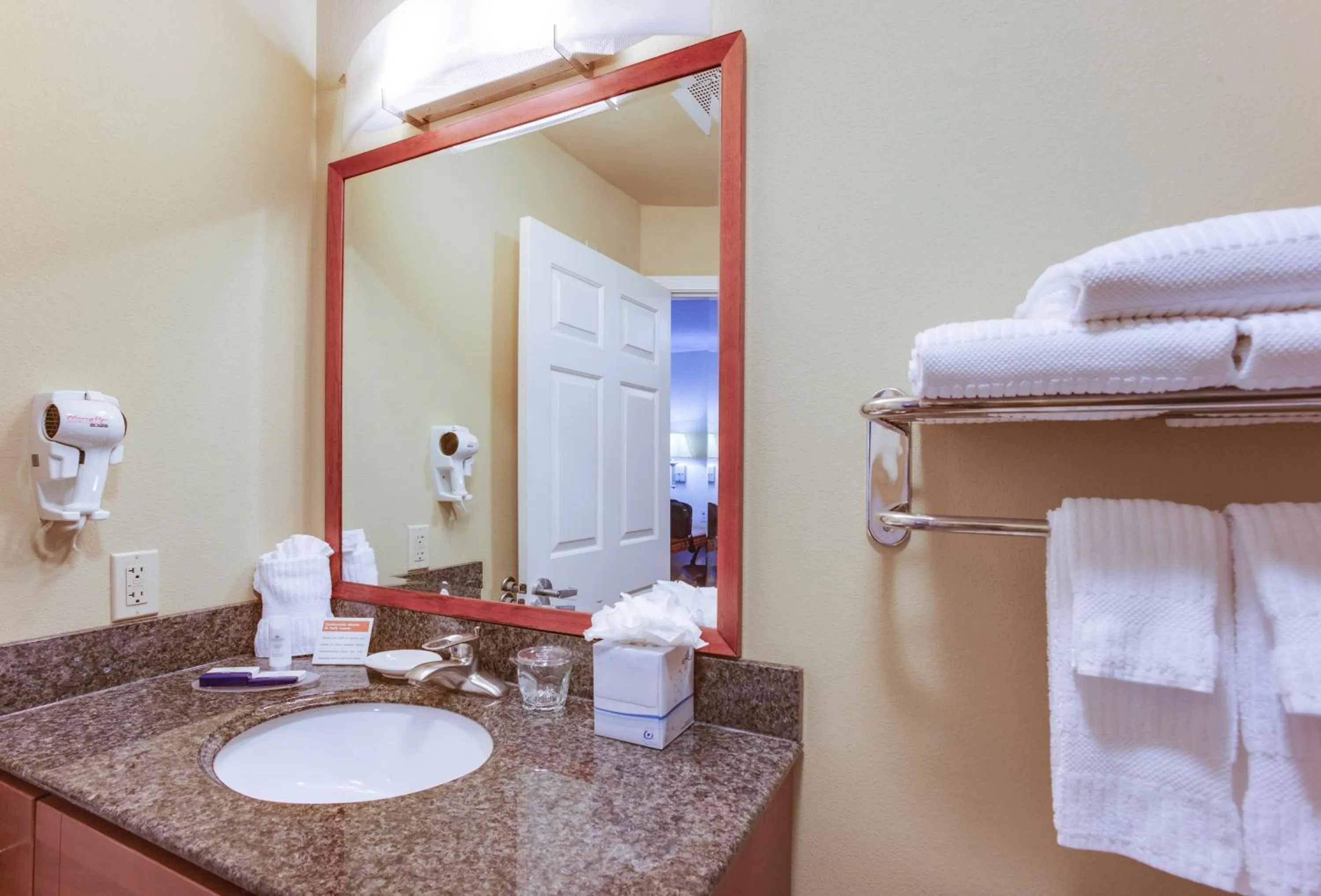Bathroom in Candlewood Suites Richmond Airport by IHG