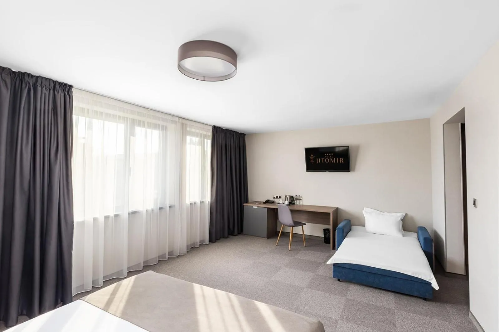 Bed in Jitomir Hotel