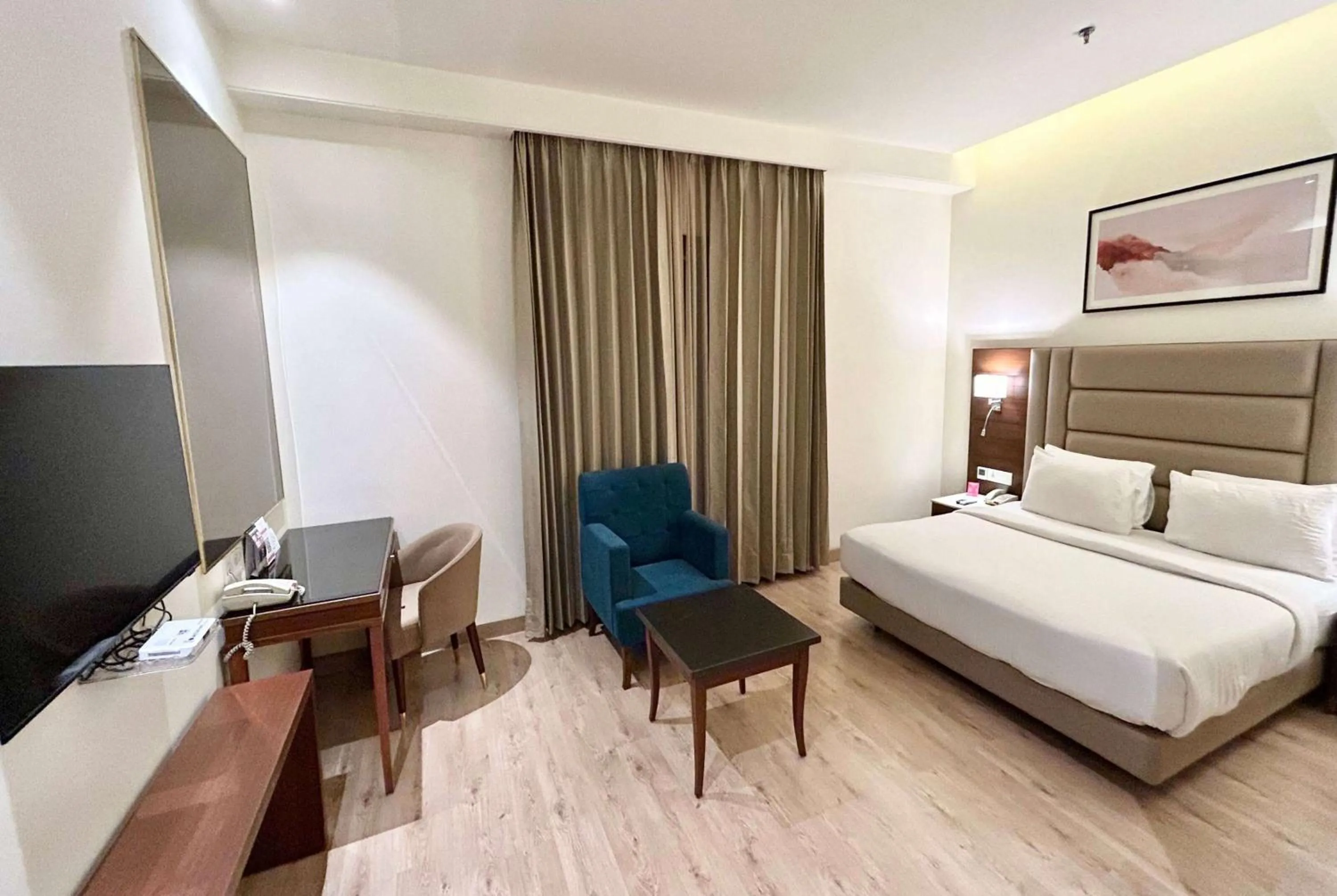 Photo of the whole room, Bed in Ramada by Wyndham Jalandhar City Center
