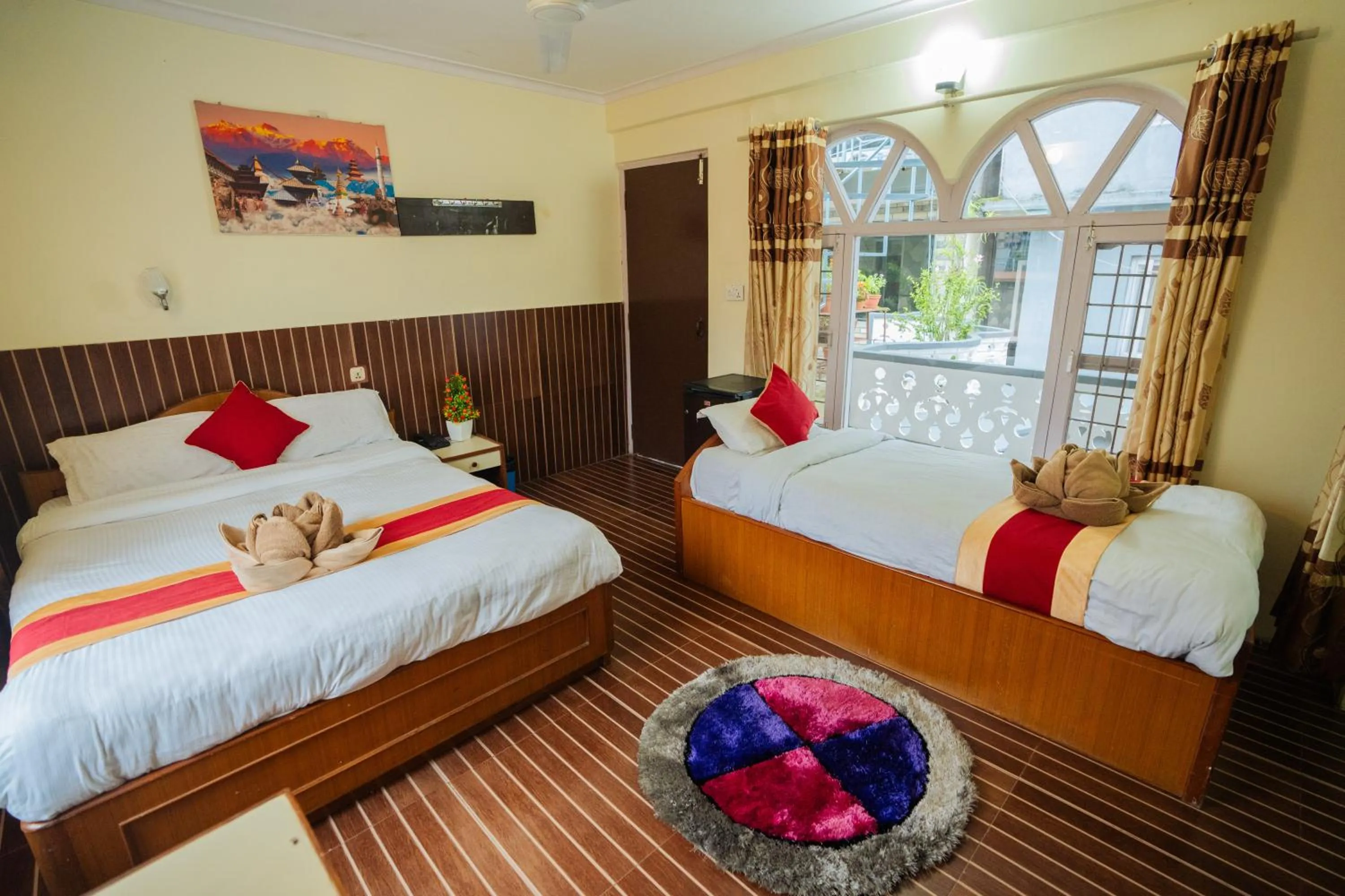 Bed in Hotel Himalayan Inn