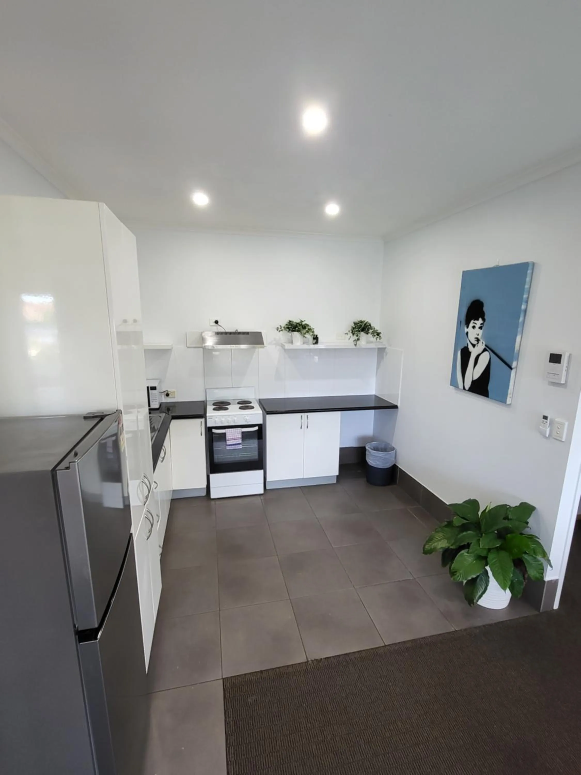 Kitchen or kitchenette in Central Motel Mooloolaba and Apartments