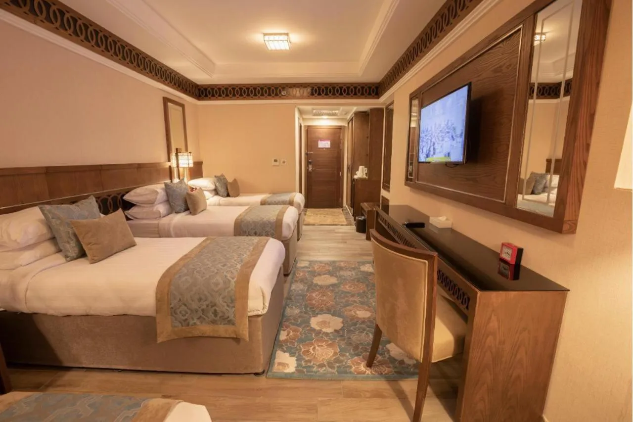 Bed in Violet Al Azizia Hotel MASJID Al Qatari