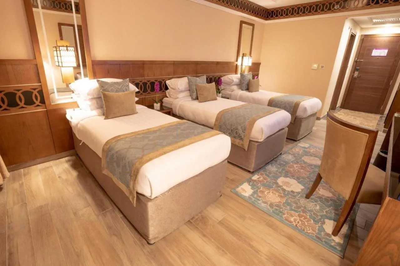 Bed in Violet Al Azizia Hotel MASJID Al Qatari