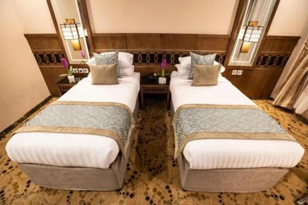 Bed in Violet Al Azizia Hotel MASJID Al Qatari