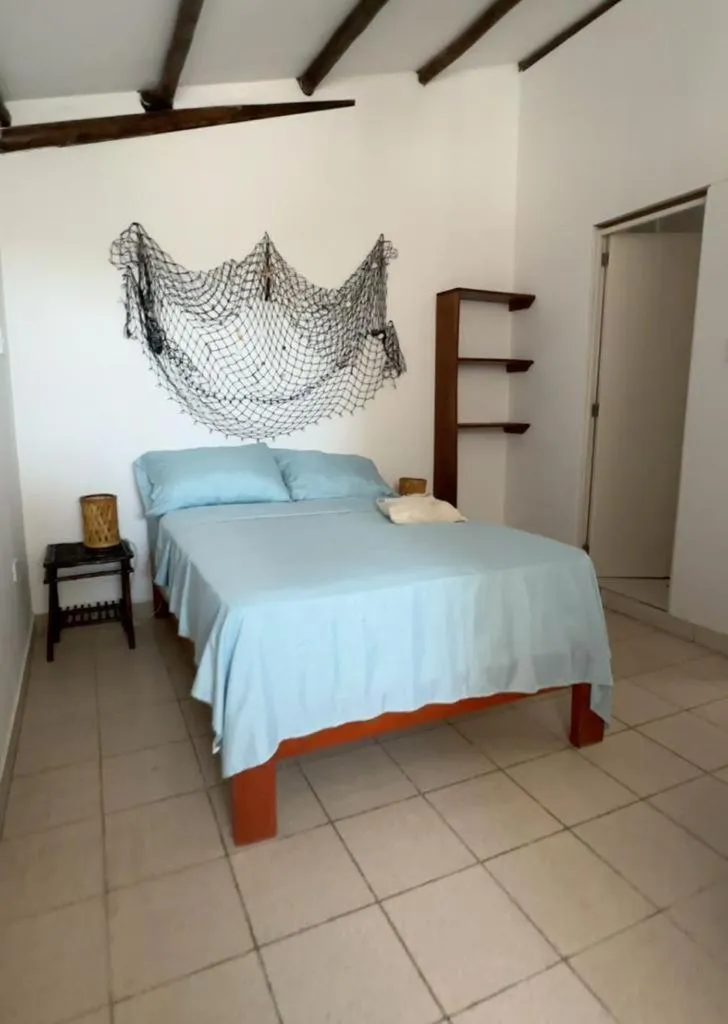 Bed in Maria Jose Bungalows
