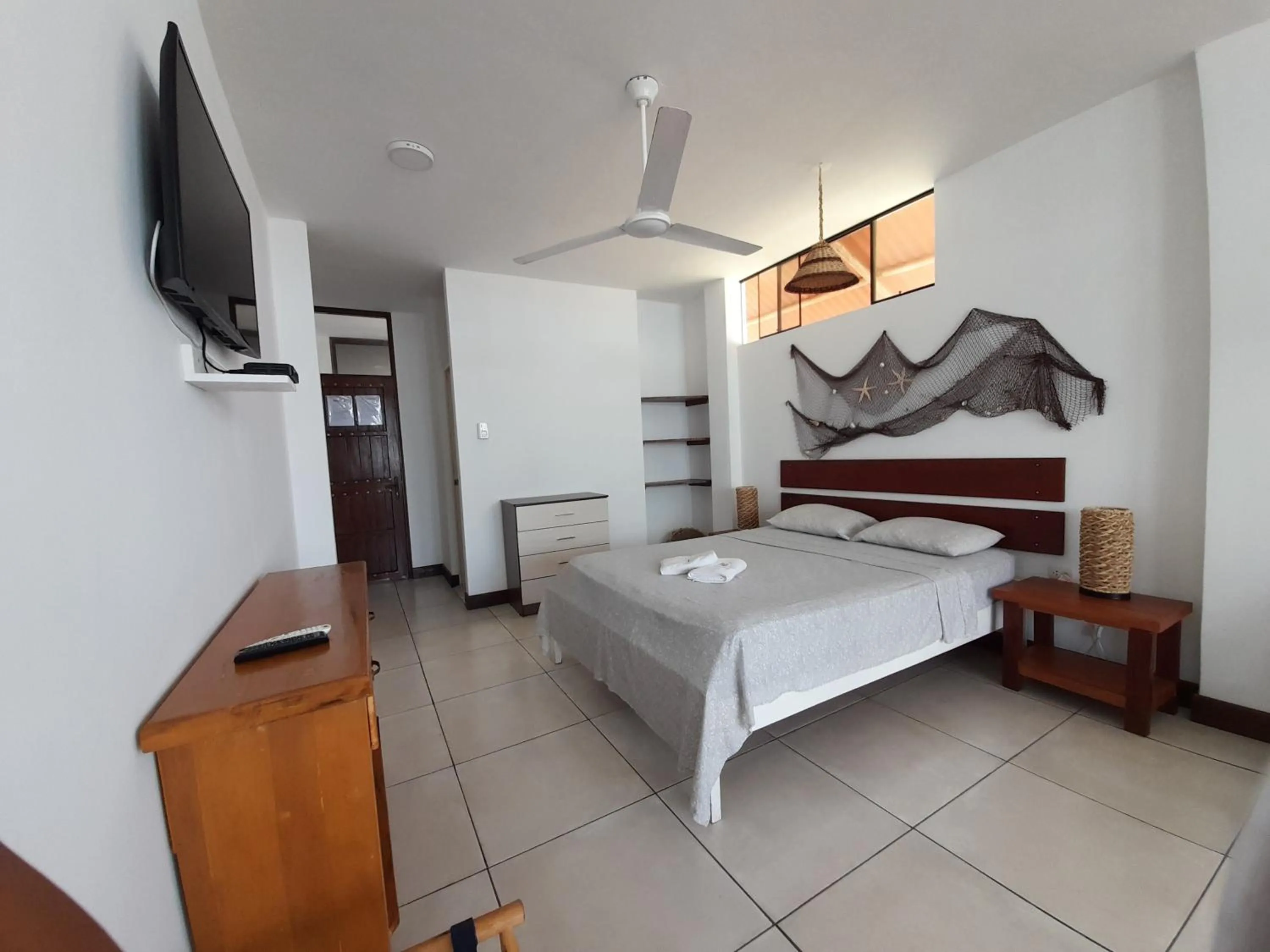 Bed in Maria Jose Bungalows