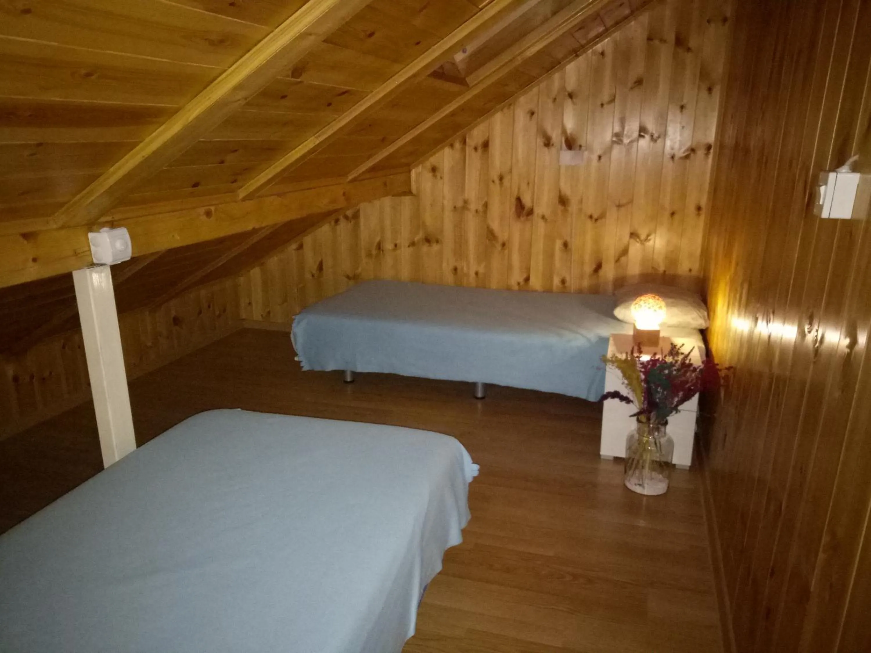 Bed in Tiki Apartmen