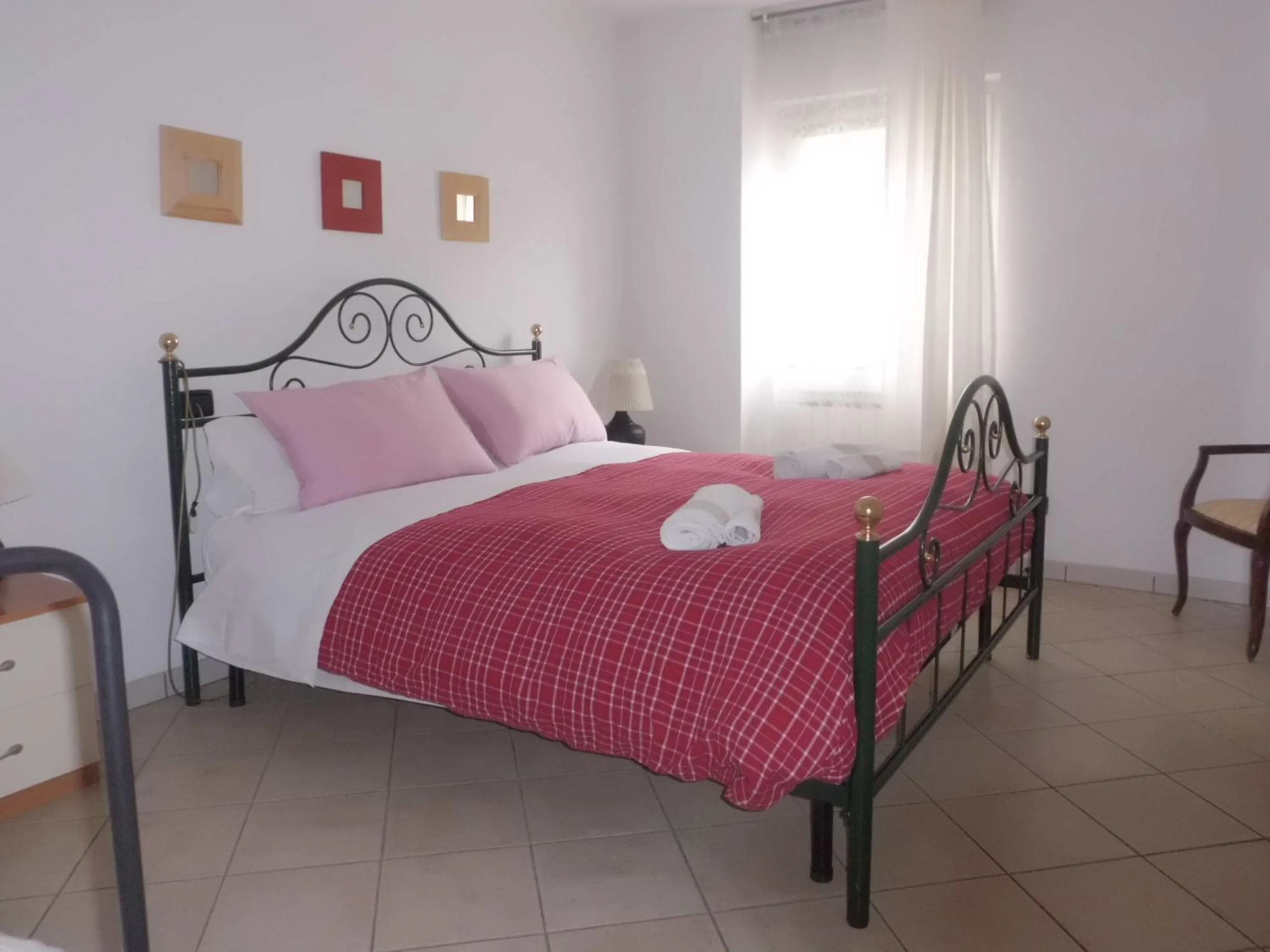 Photo of the whole room, Bed in Casa Fattorini