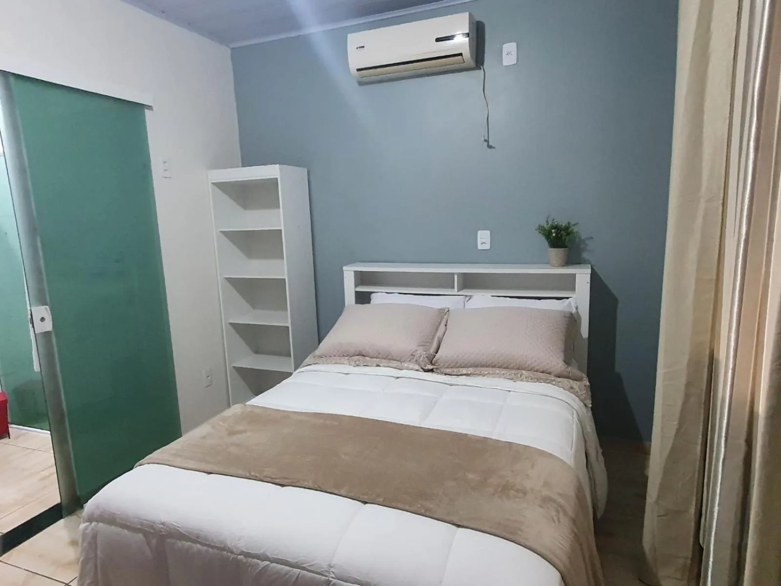 Bed in Pousada Família Cordeiro