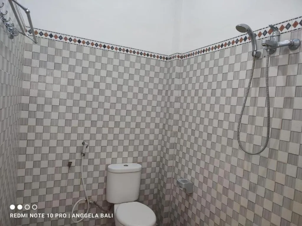 Toilet in Dream Beach Kubu & SPA by ABM