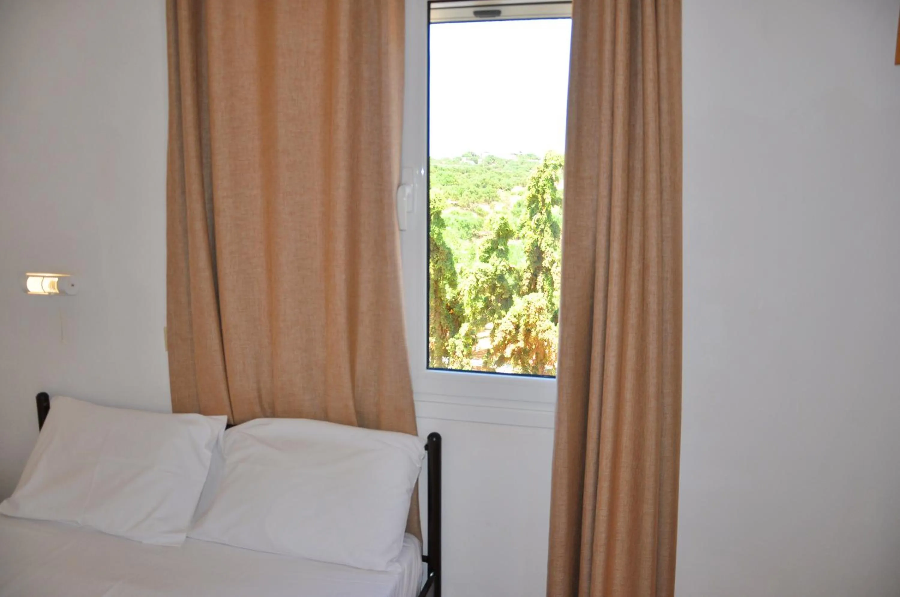 Bed in Lagos Studios & Apartments