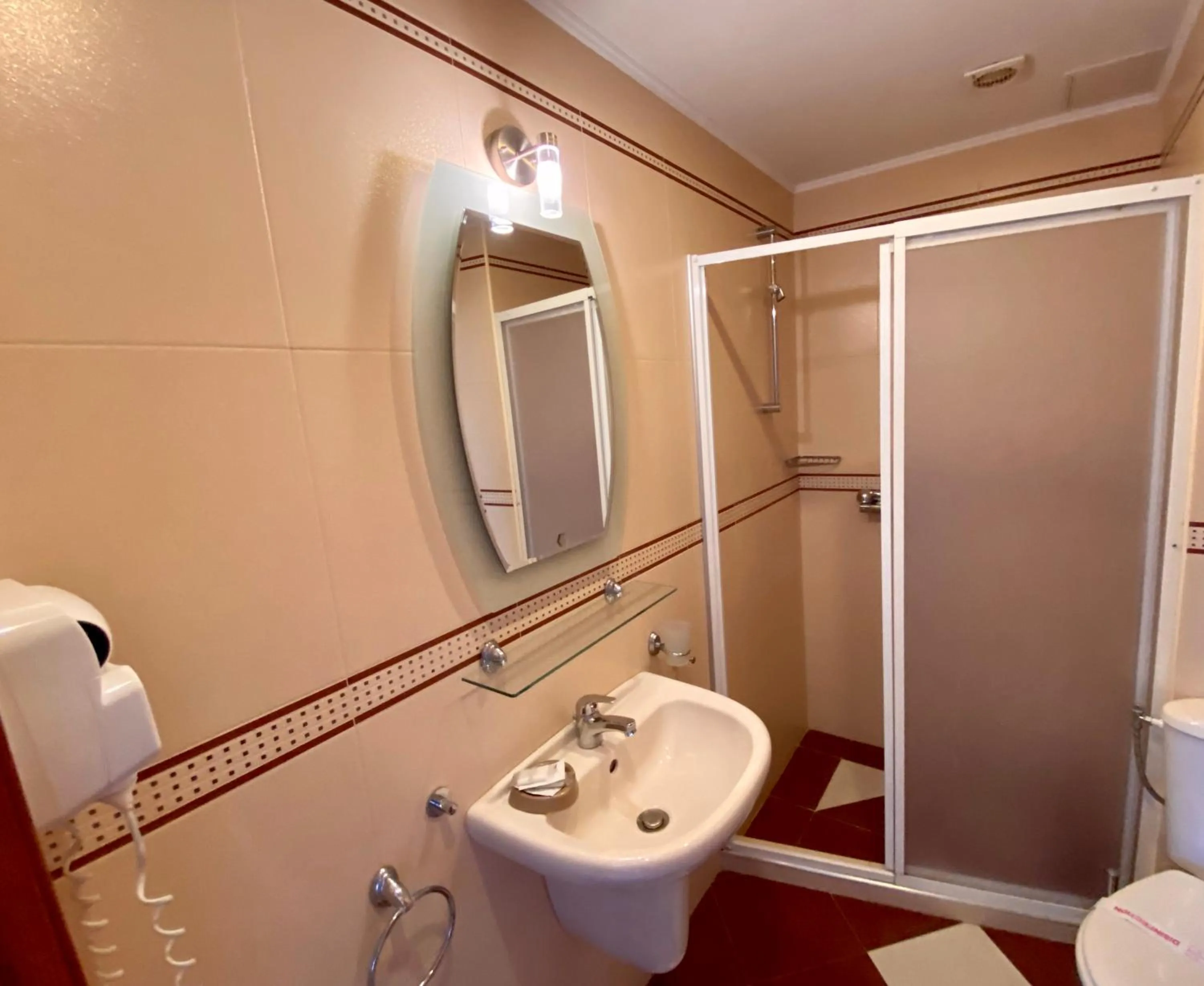 Bathroom in Family Hotel Saint Nikola and Free parking